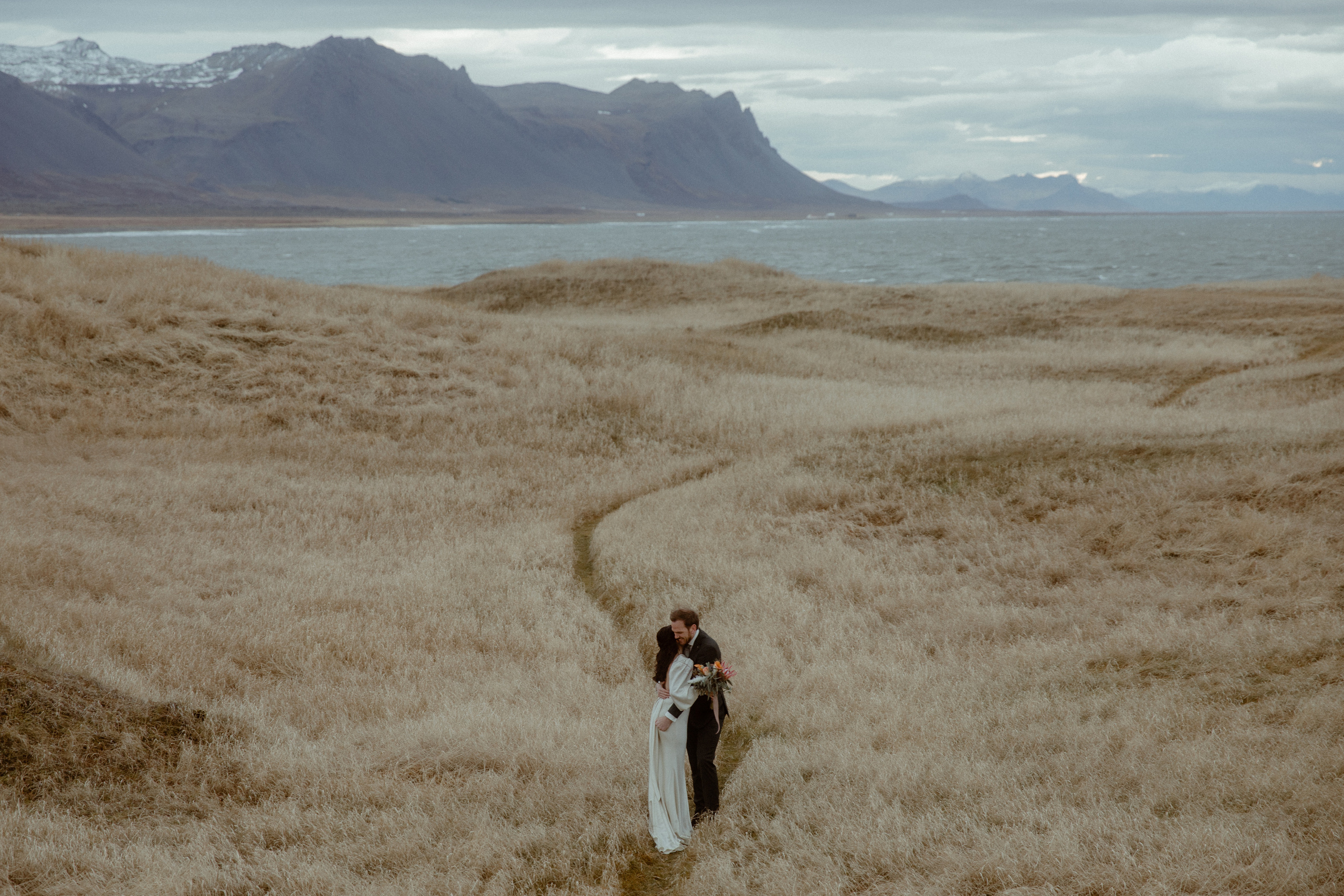 Elopement at Snaefellsnes Iceland | Wedding photos with Icelandic horses. Iceland elopement photographer & videographer