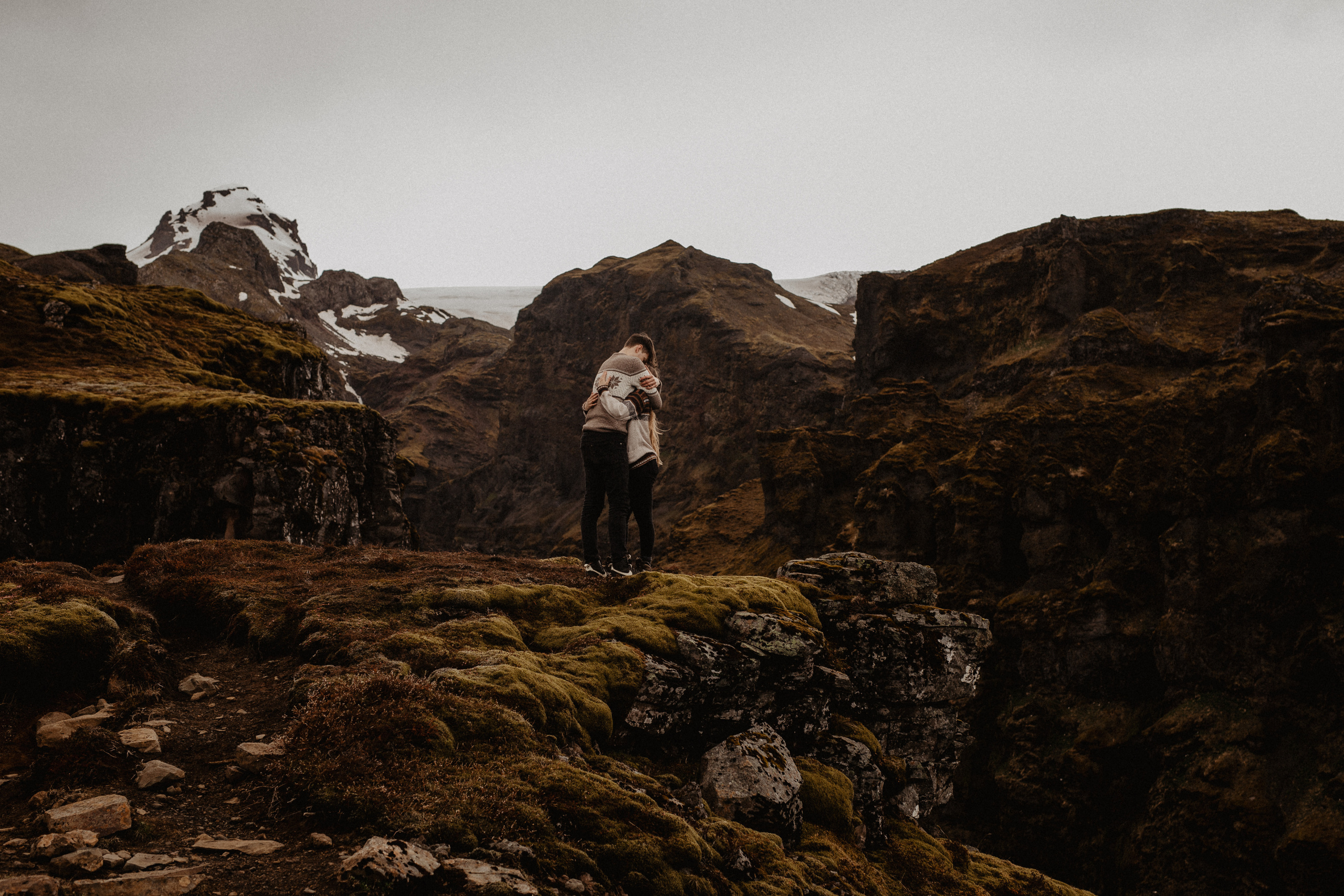Couple photoshoot in front of volcano eruption in Iceland. Iceland elopement photographer & videographer