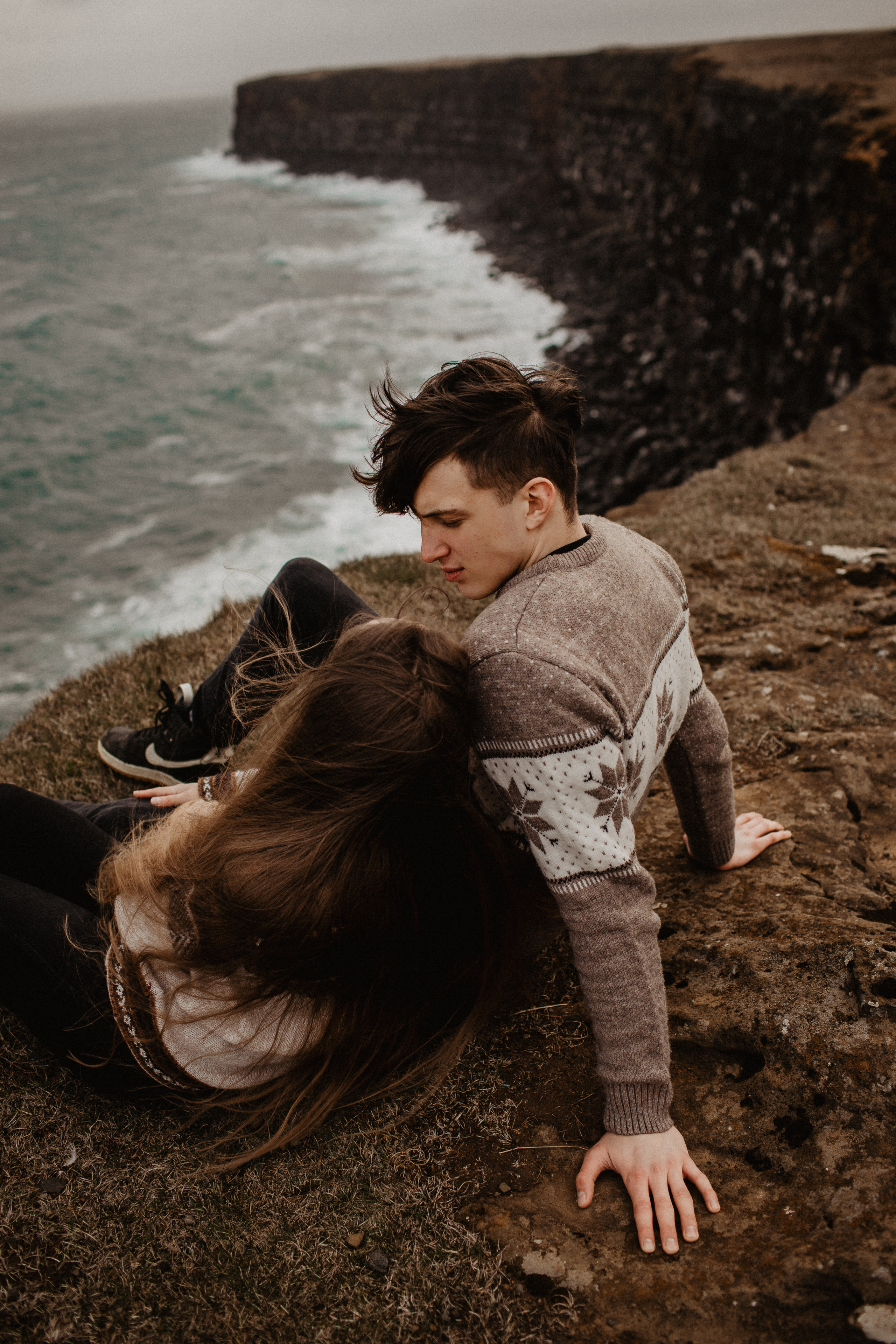 Couple photoshoot in front of volcano eruption in Iceland. Iceland elopement photographer & videographer