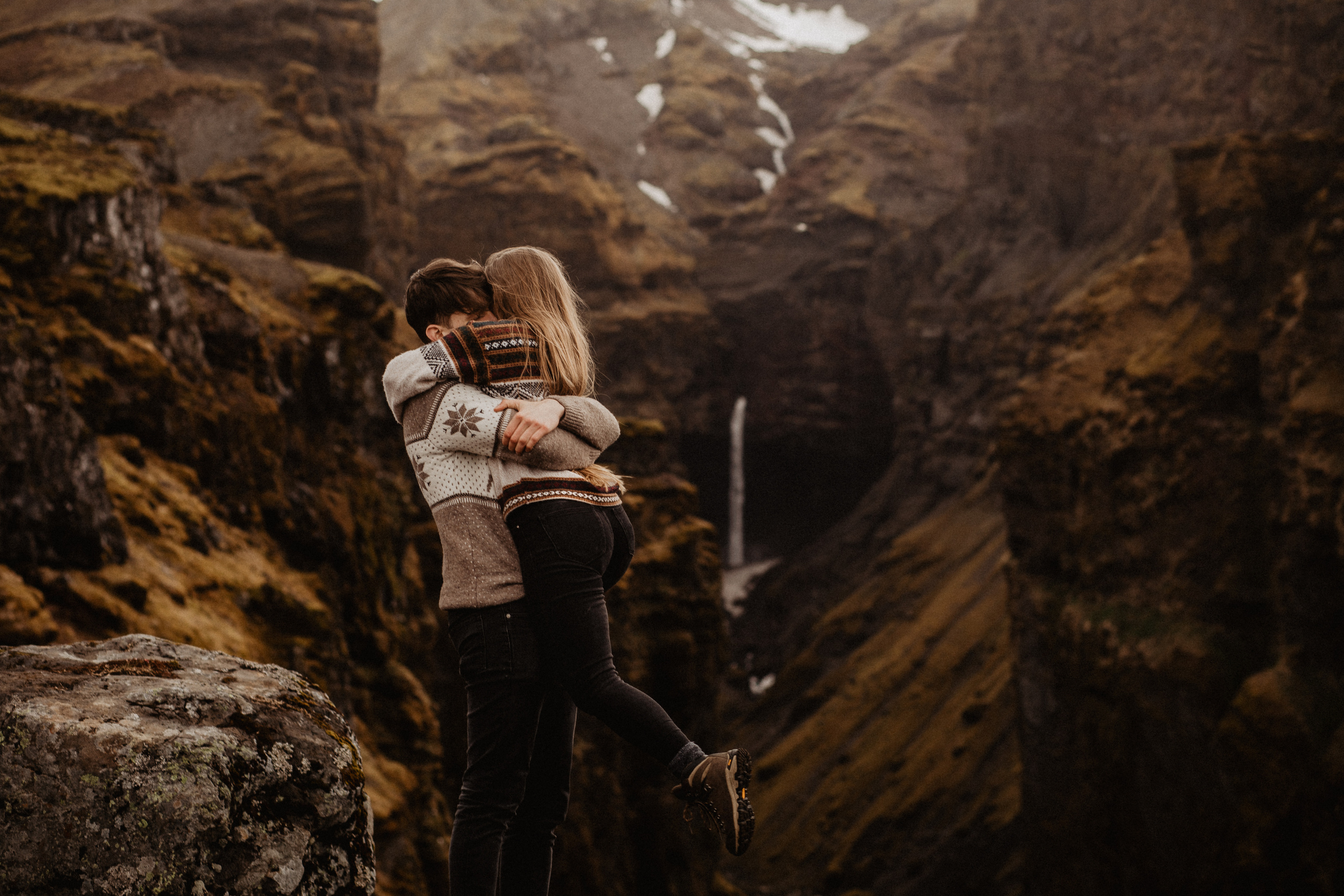 Couple photoshoot in front of volcano eruption in Iceland. Iceland elopement photographer & videographer