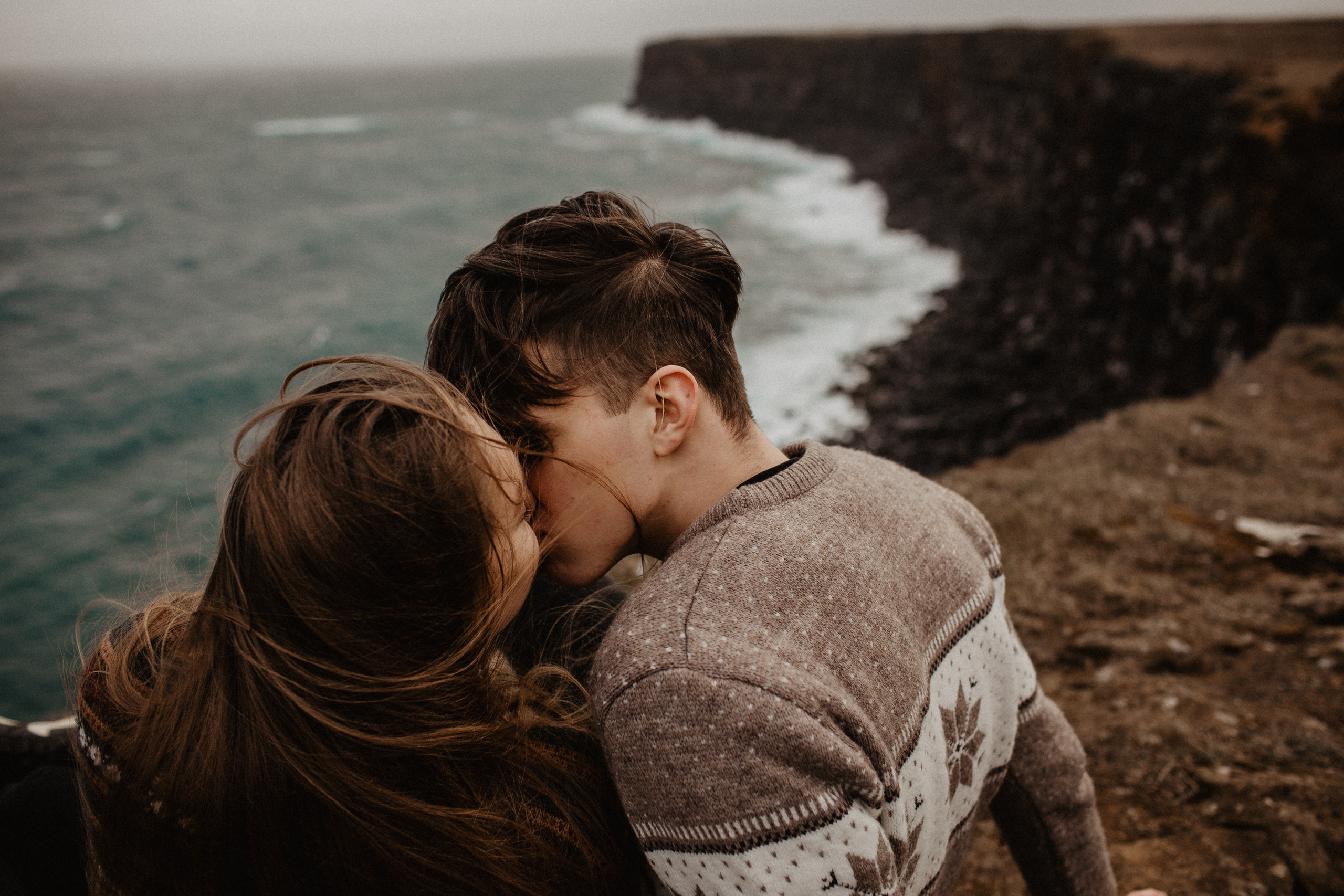 Couple photoshoot in front of volcano eruption in Iceland. Iceland elopement photographer & videographer