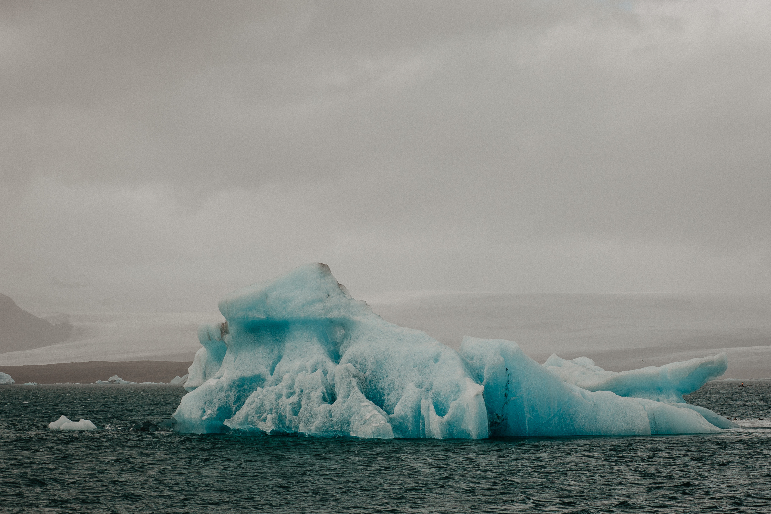 Couple photoshoot in front of volcano eruption in Iceland. Iceland elopement photographer & videographer