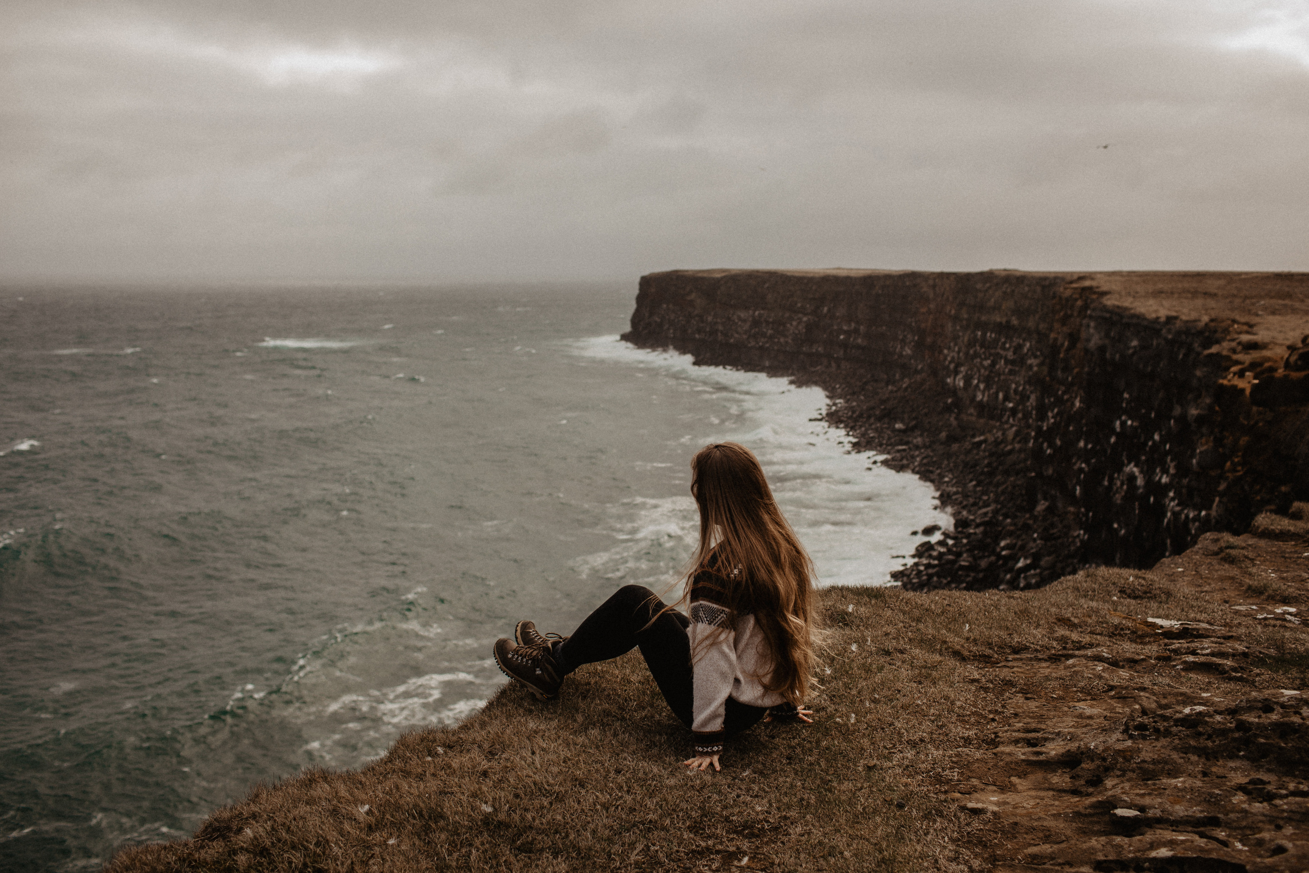 Couple photoshoot in front of volcano eruption in Iceland. Iceland elopement photographer & videographer