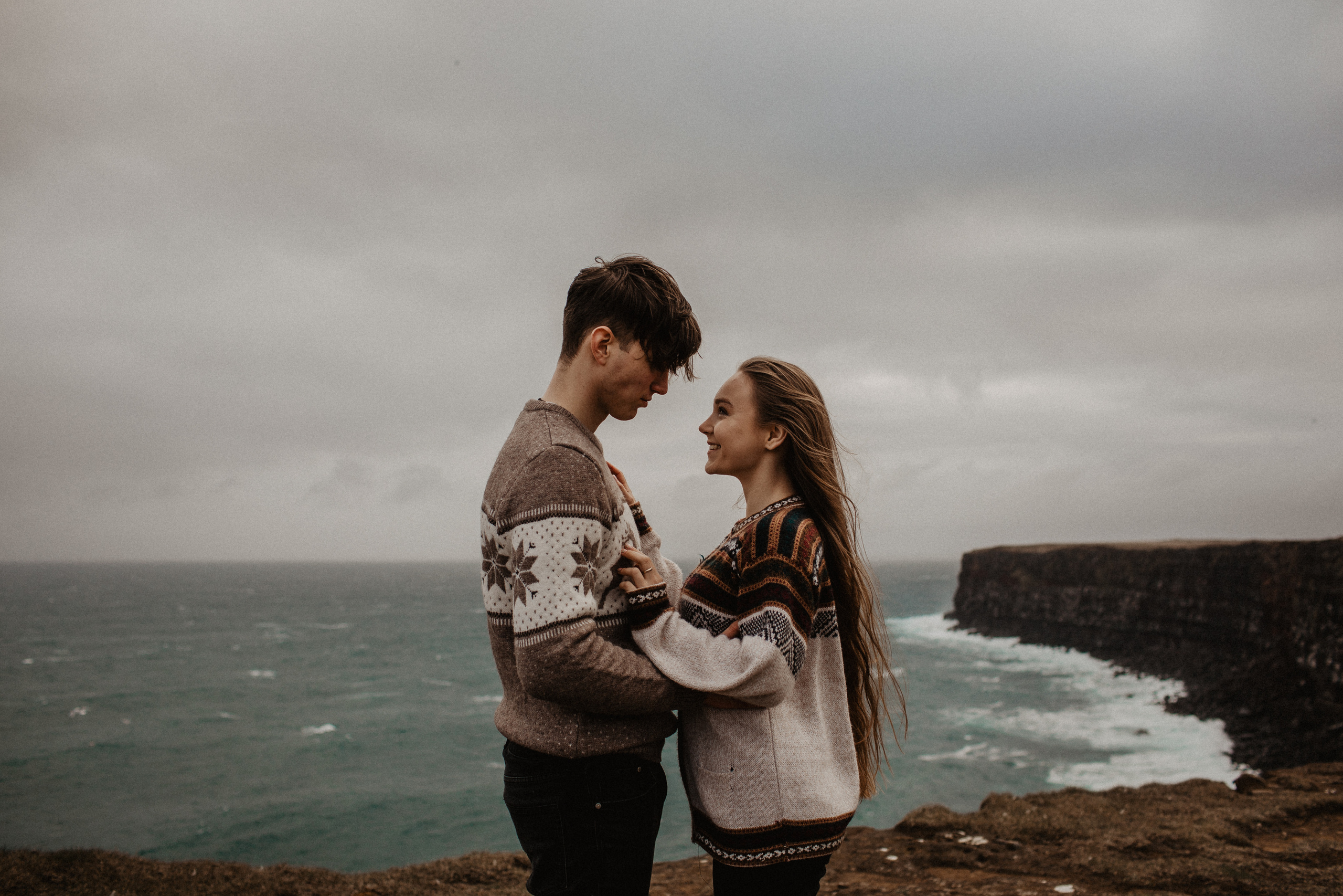 Couple photoshoot in front of volcano eruption in Iceland. Iceland elopement photographer & videographer