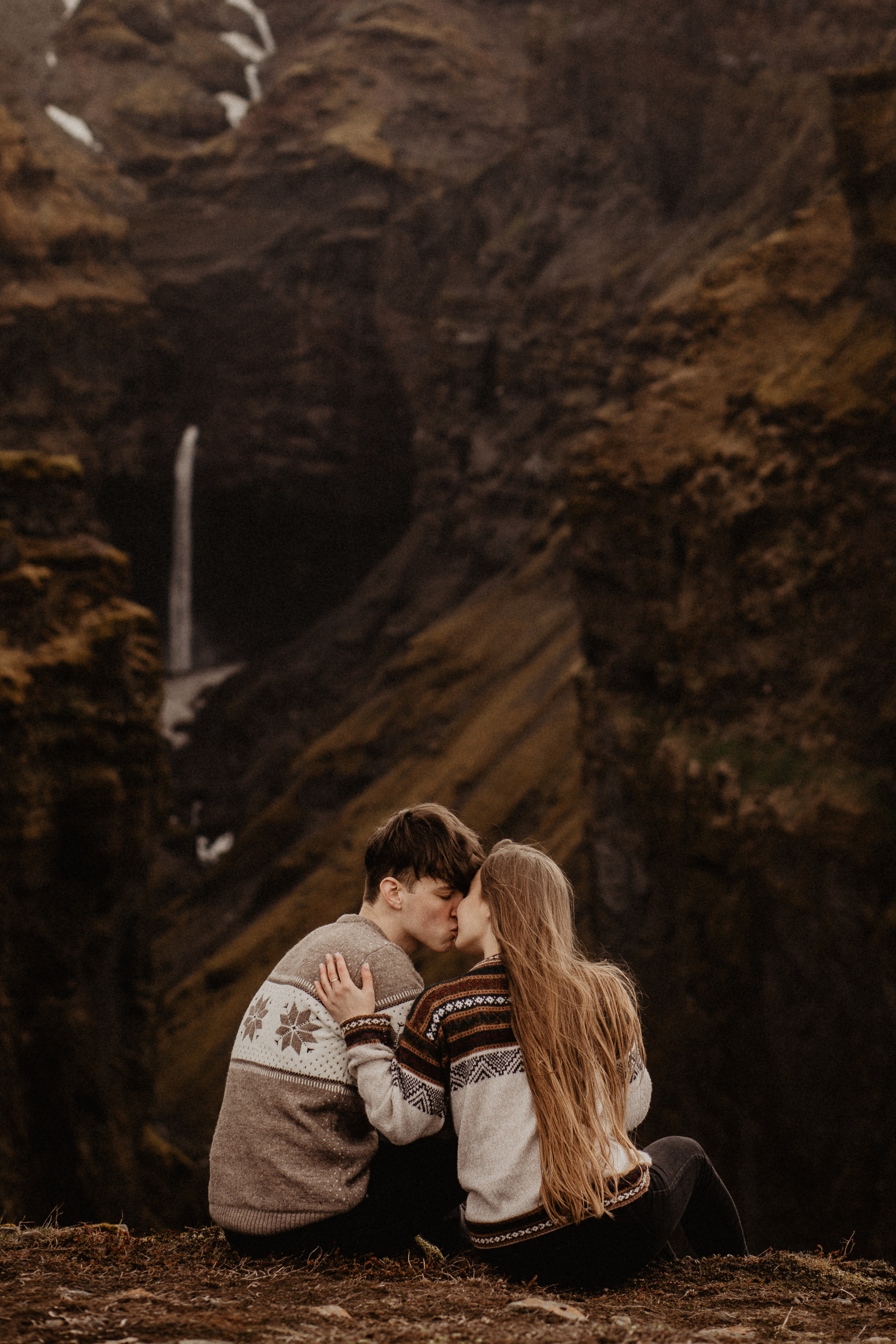 Couple photoshoot in front of volcano eruption in Iceland. Iceland elopement photographer & videographer