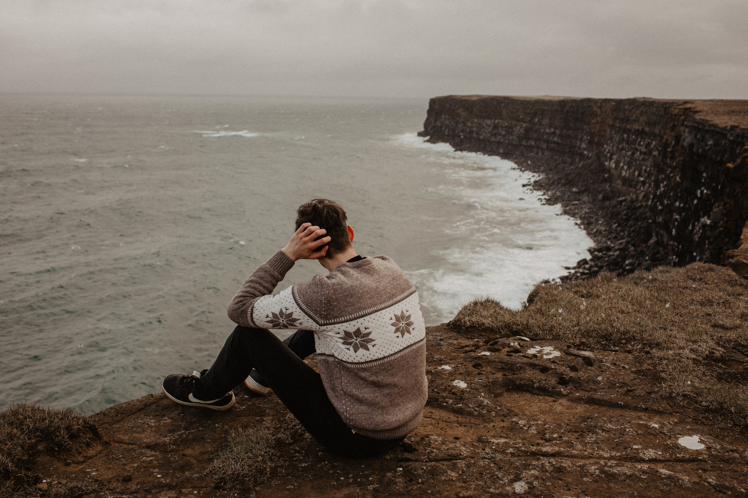 Couple photoshoot in front of volcano eruption in Iceland. Iceland elopement photographer & videographer