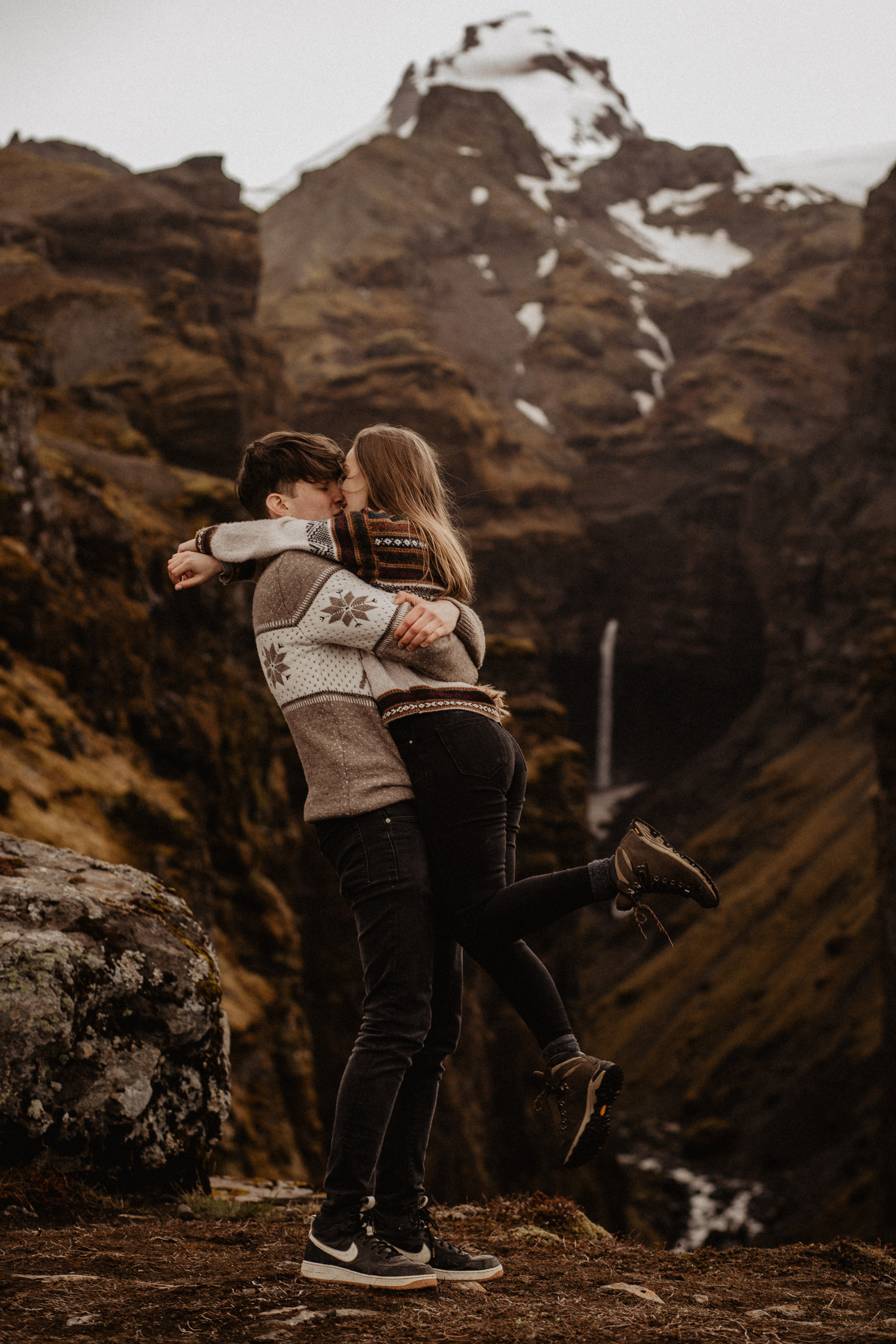 Couple photoshoot in front of volcano eruption in Iceland. Iceland elopement photographer & videographer