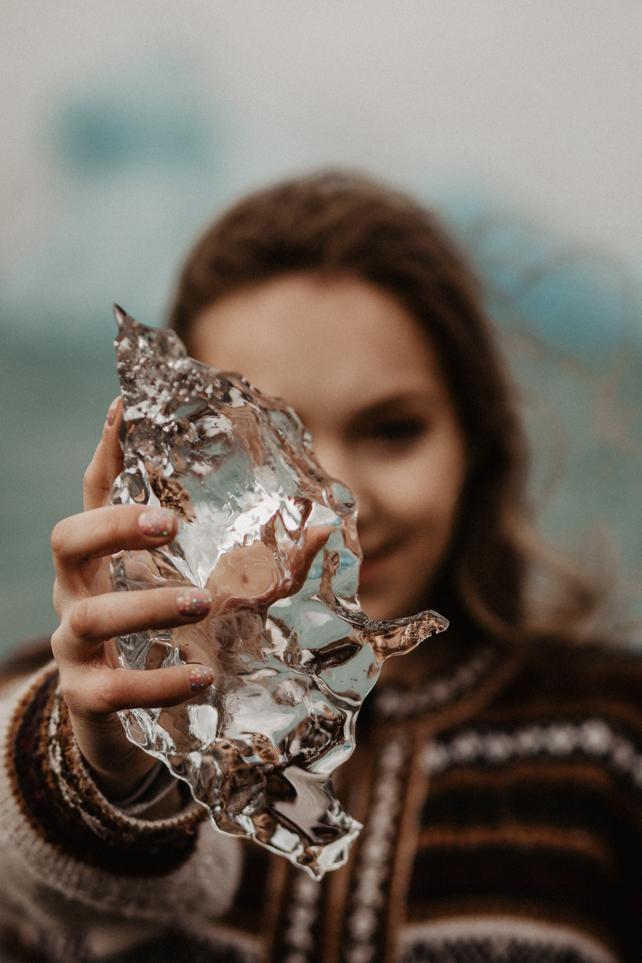 Couple photoshoot in front of volcano eruption in Iceland. Iceland elopement photographer & videographer