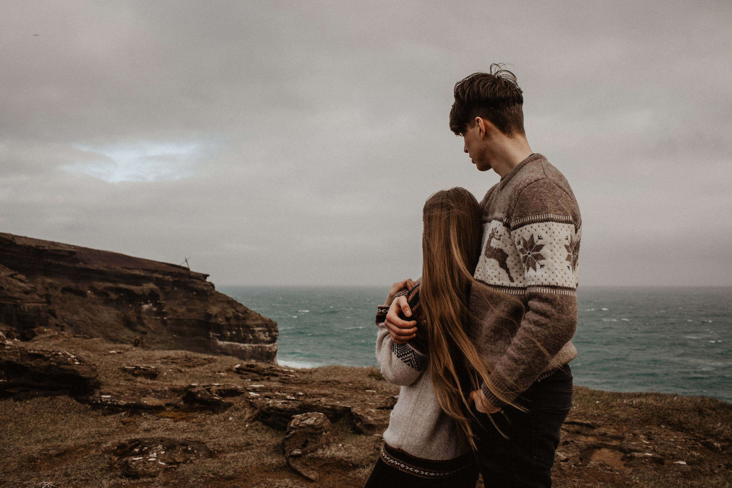 Couple photoshoot in front of volcano eruption in Iceland. Iceland elopement photographer & videographer