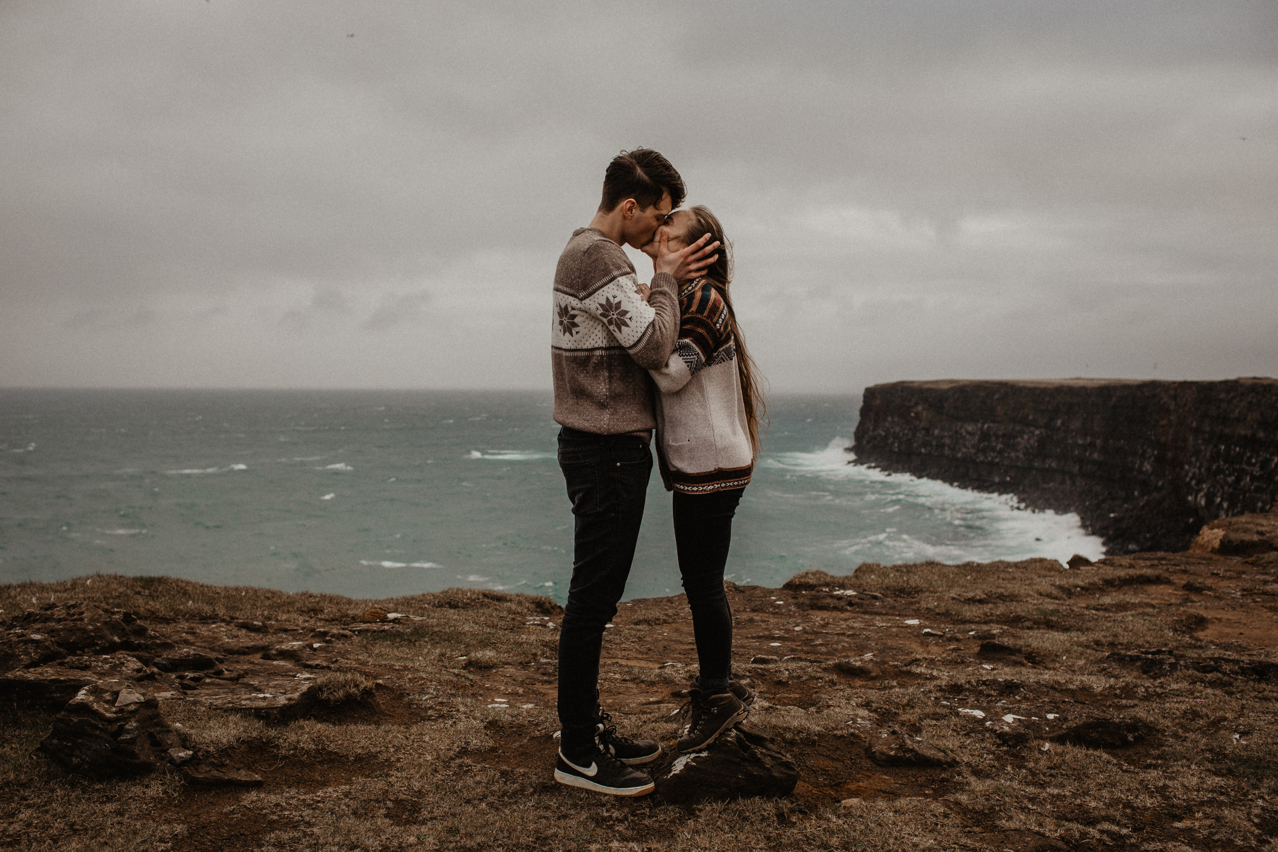 Couple photoshoot in front of volcano eruption in Iceland. Iceland elopement photographer & videographer
