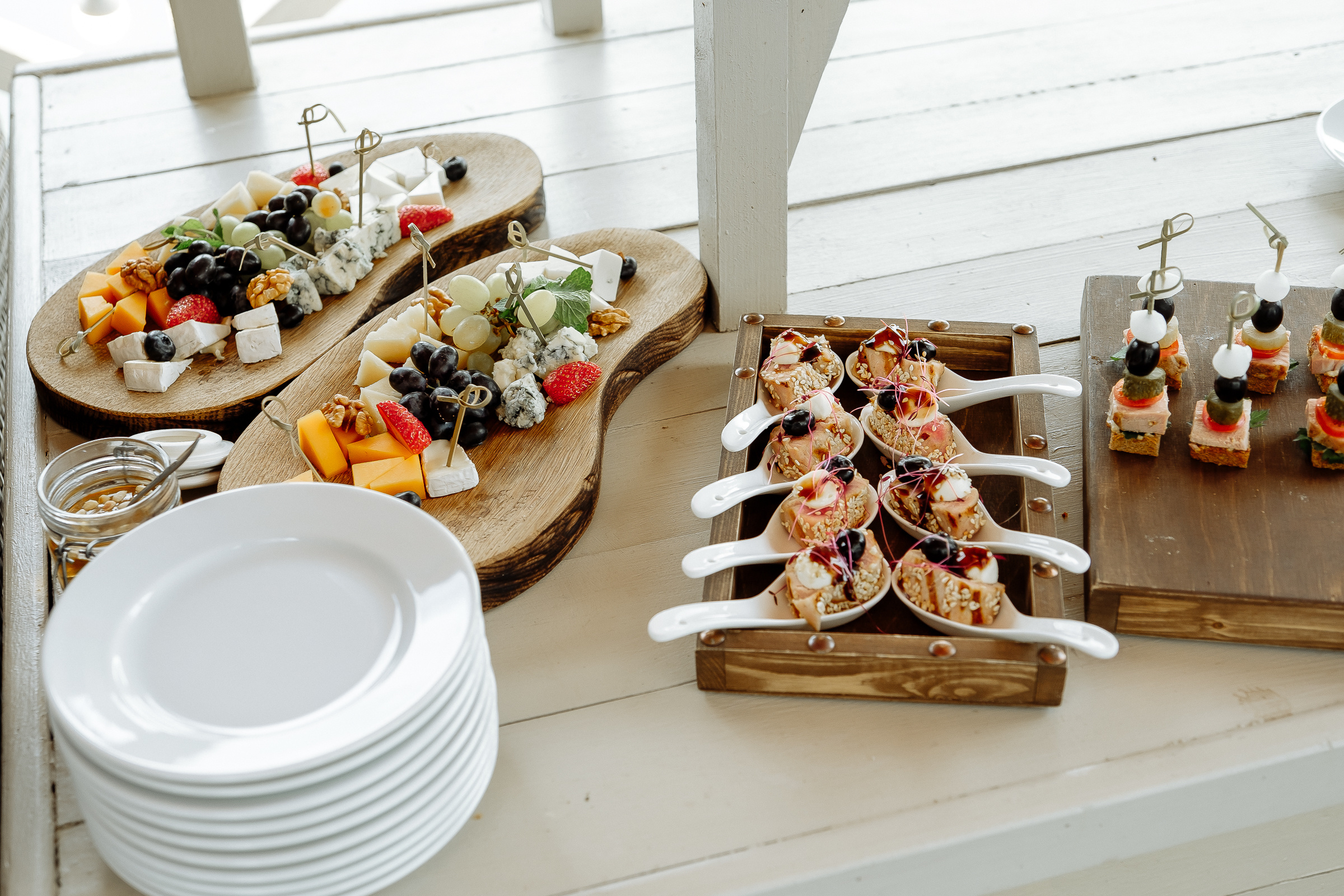 Guests on riverboat deck at sunset, by Tanya Bodgan, Bude wedding photography.  