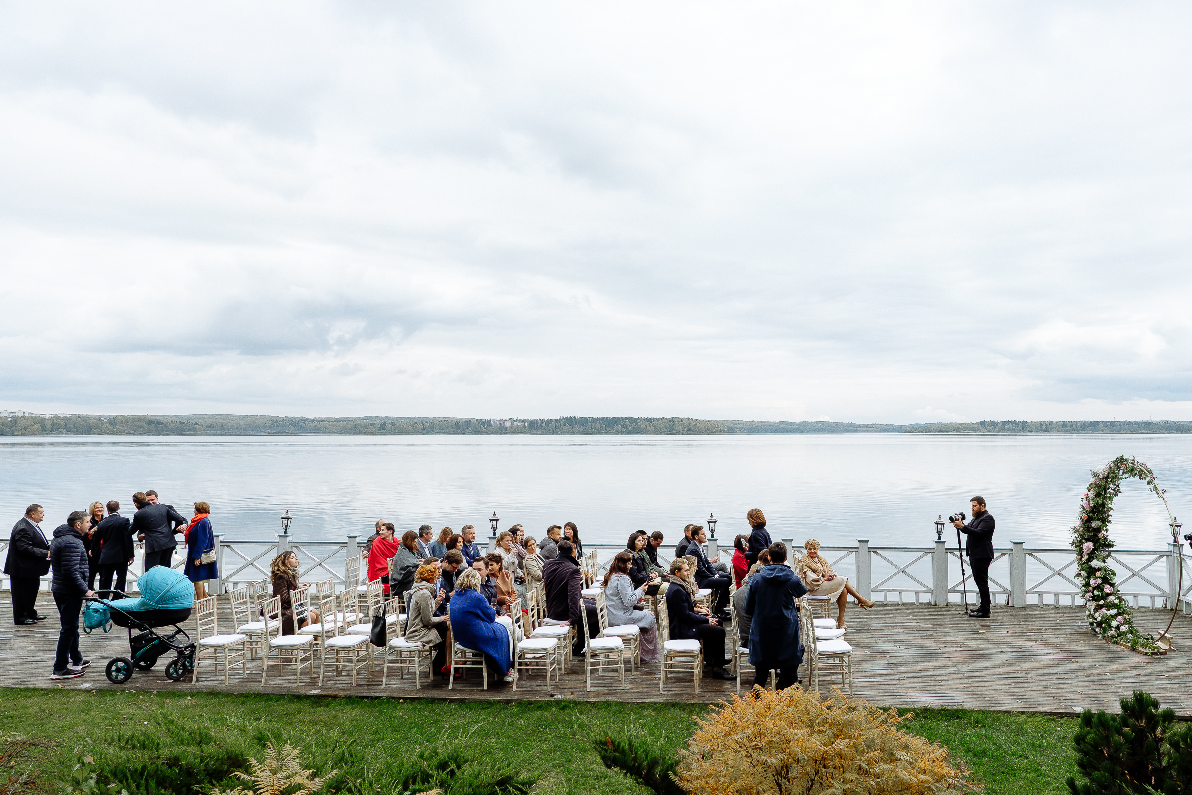 Guests awaiting ceremony on riverboat deck, by Tanya Bodgan, Bude, Cornwall wedding photographer.  