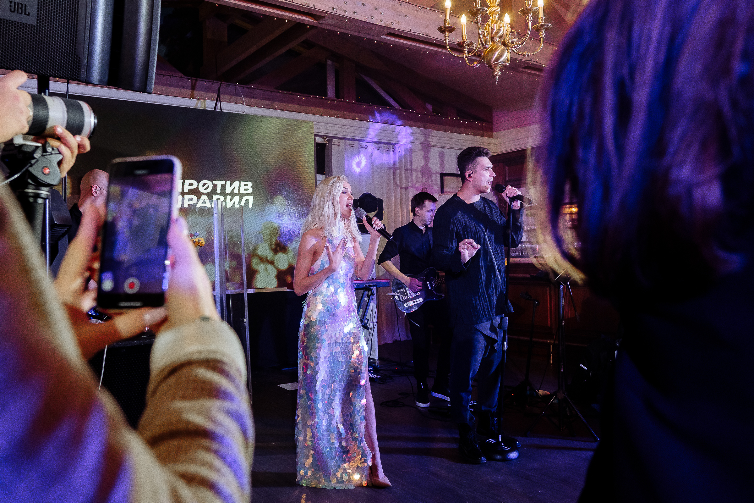 Guests grooving at reception, by Tanya Bodgan, St Ives wedding photography.