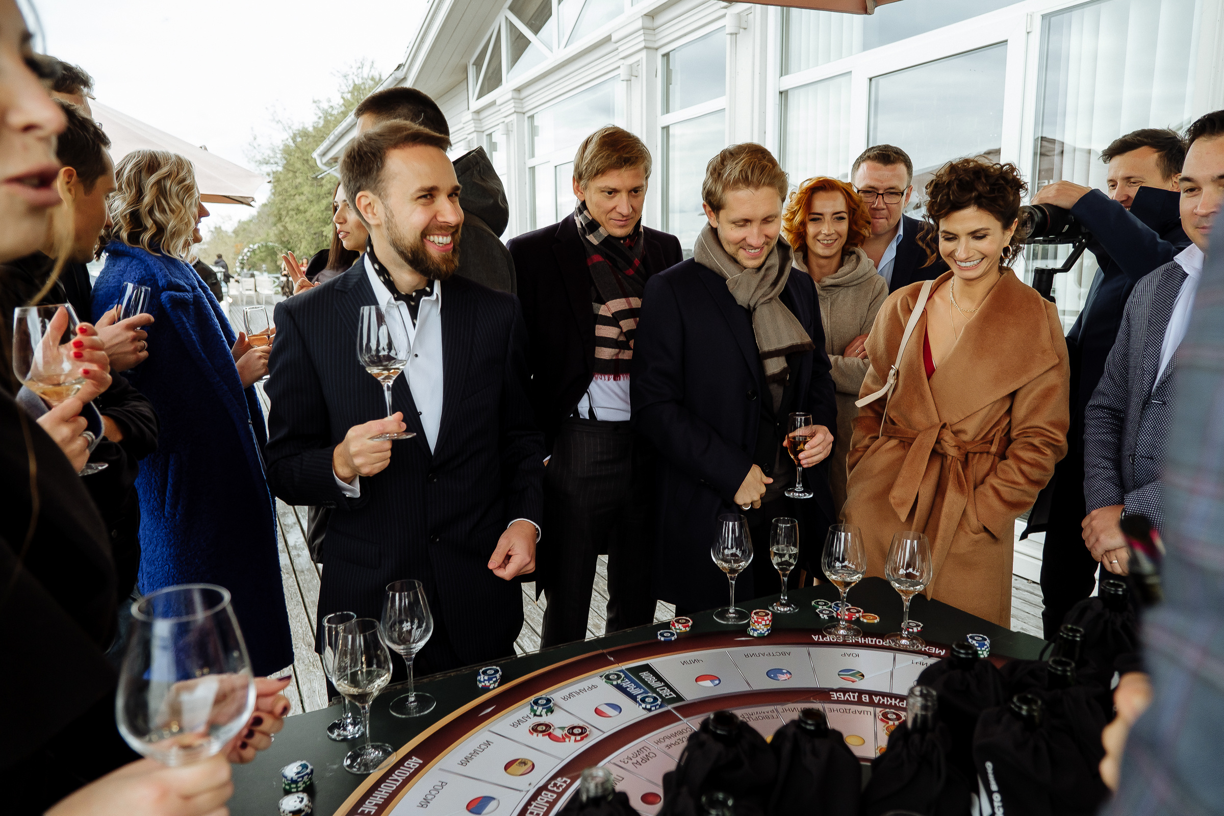 Guests gambling, by Tanya Bodgan, Bude wedding photography.  