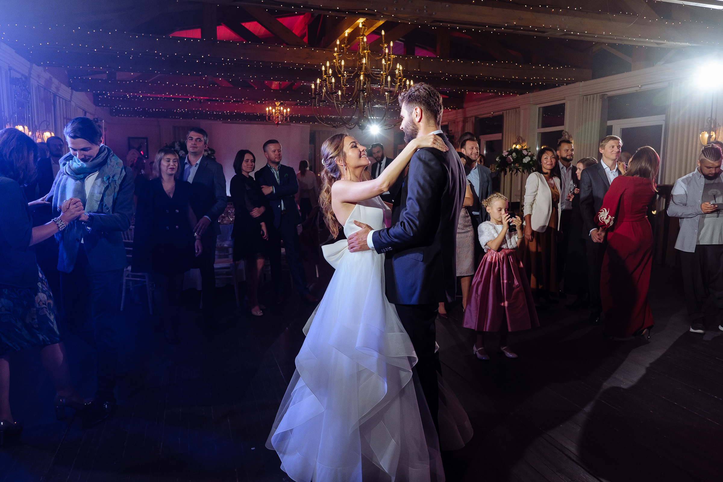 Bride on dance floor, by Tanya Bodgan, Bude editorial and reportage wedding photography.