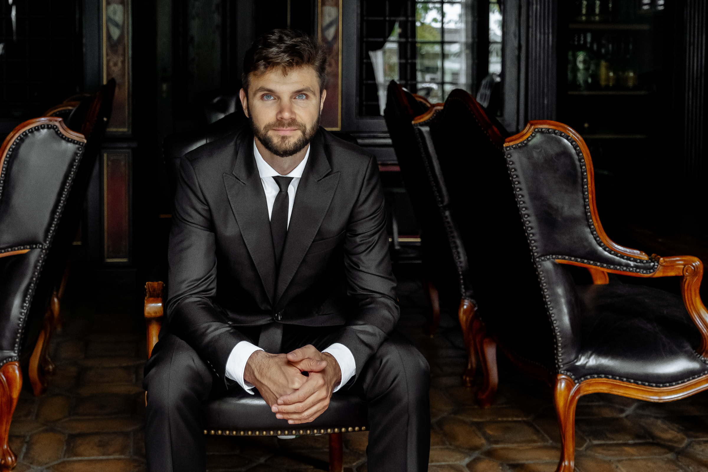Groom’s morning portrait, by Tanya Bodgan, Cornwall wedding photography.