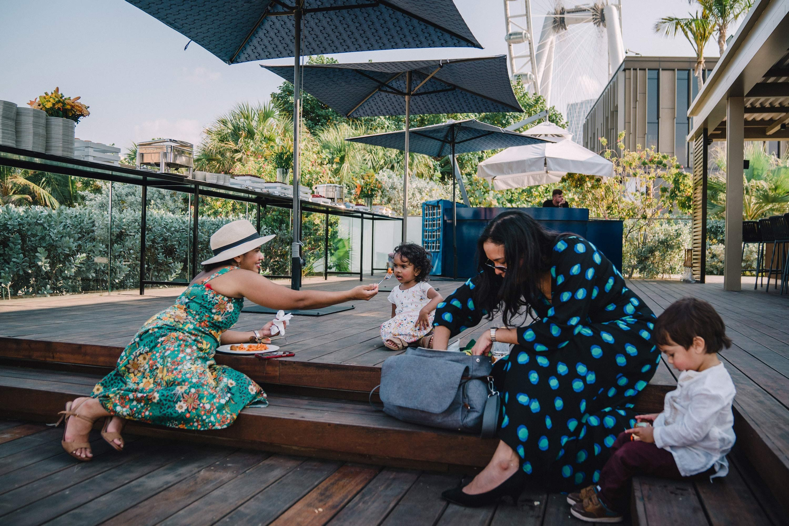 Ladies trying to feed their kids 