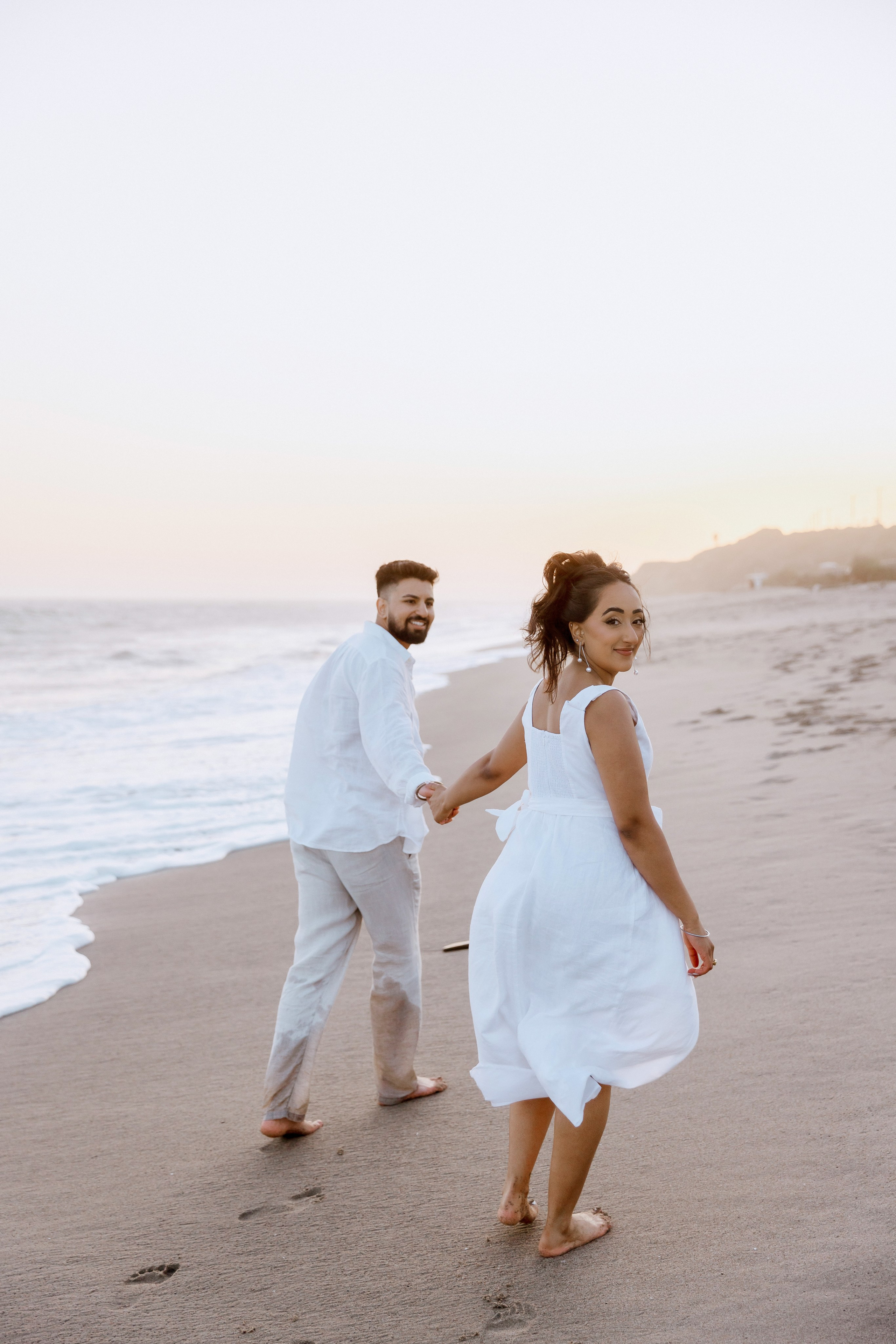 Engagement Photoshoot at Malibu Beach | Taya Frank. Southern California Family and Couple Photographer