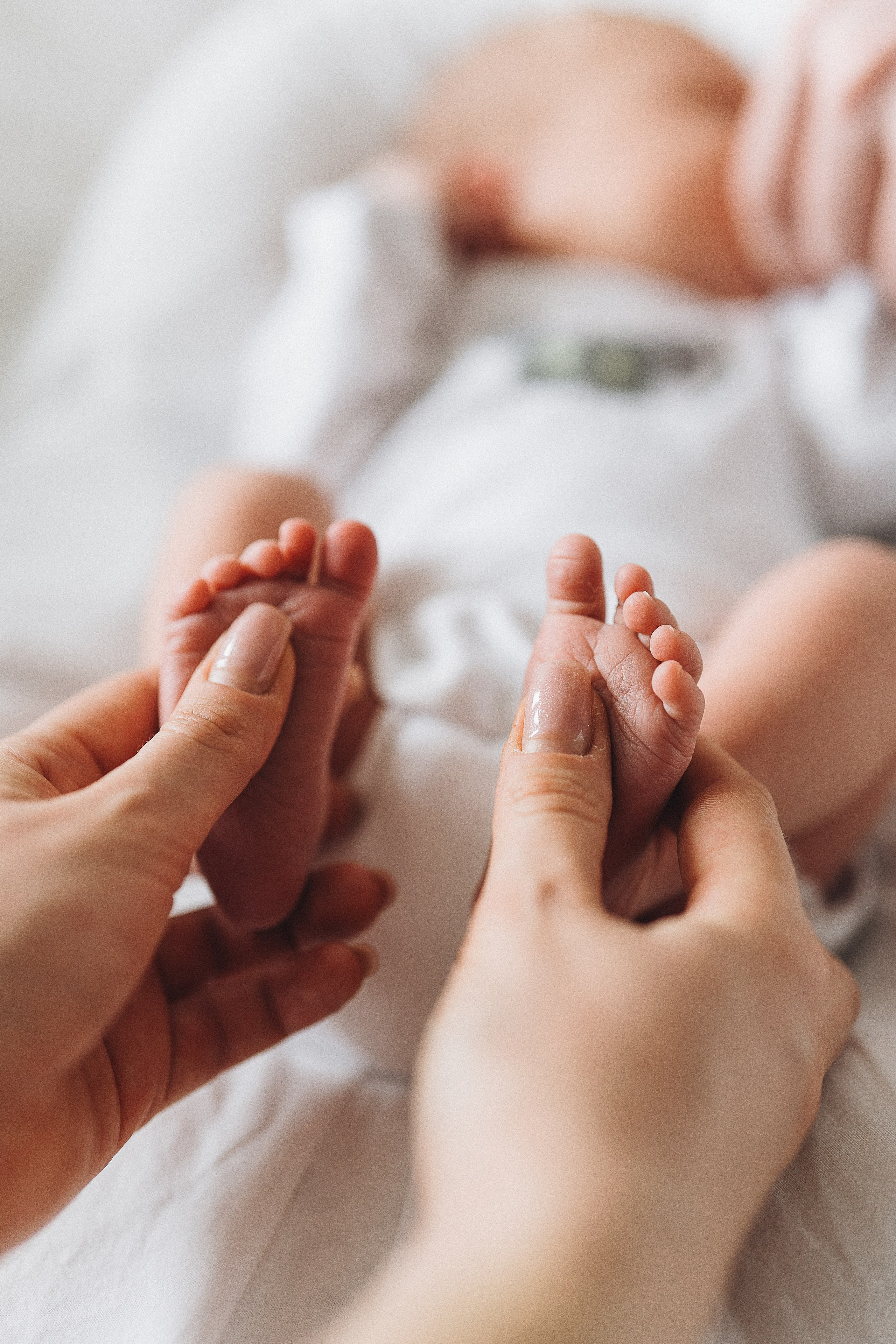 Baby girl home shooting. Family, conceptual women portrait photograher in Geneva, Switzerland