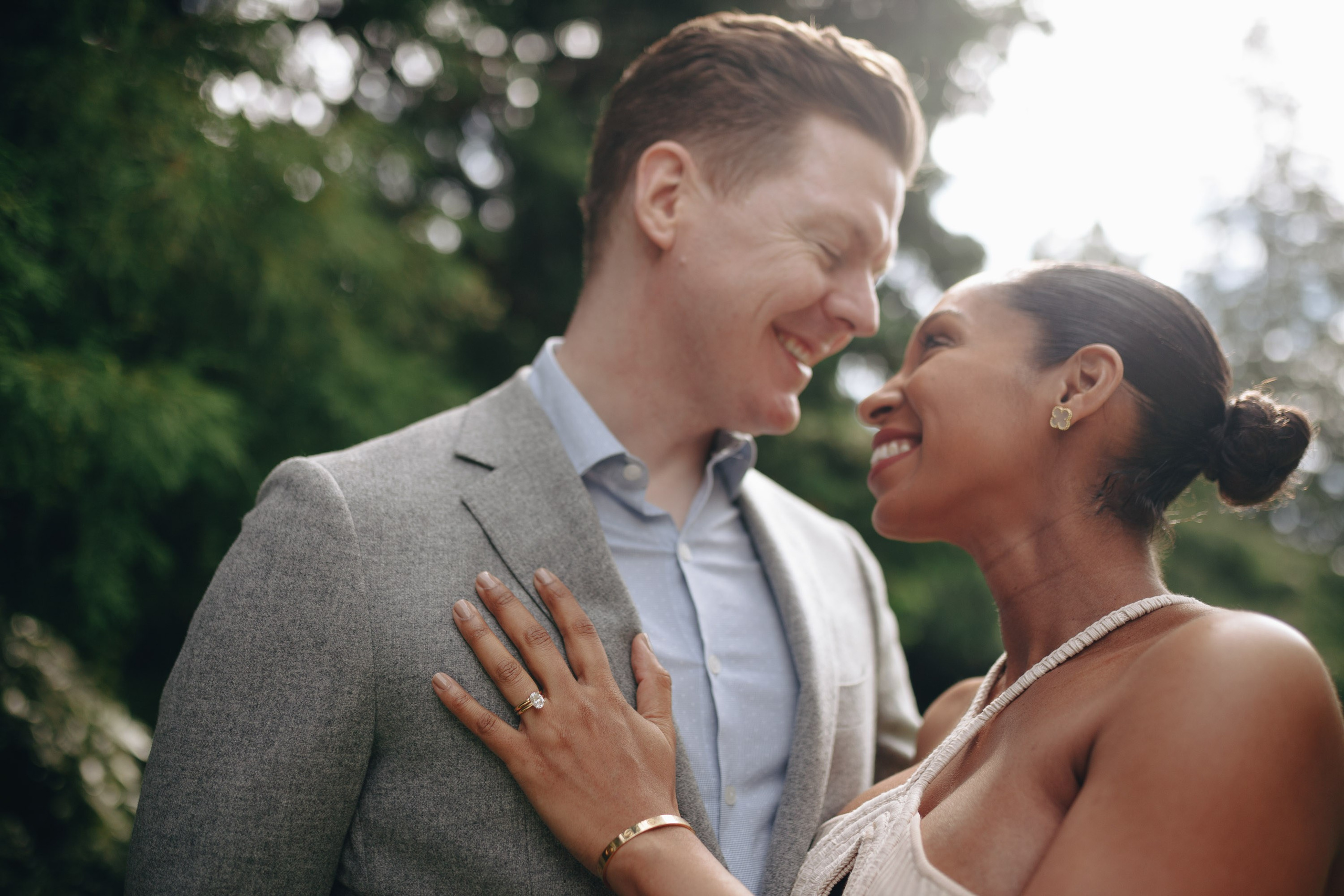 Bride and groom gazing at each other, romantic portrait