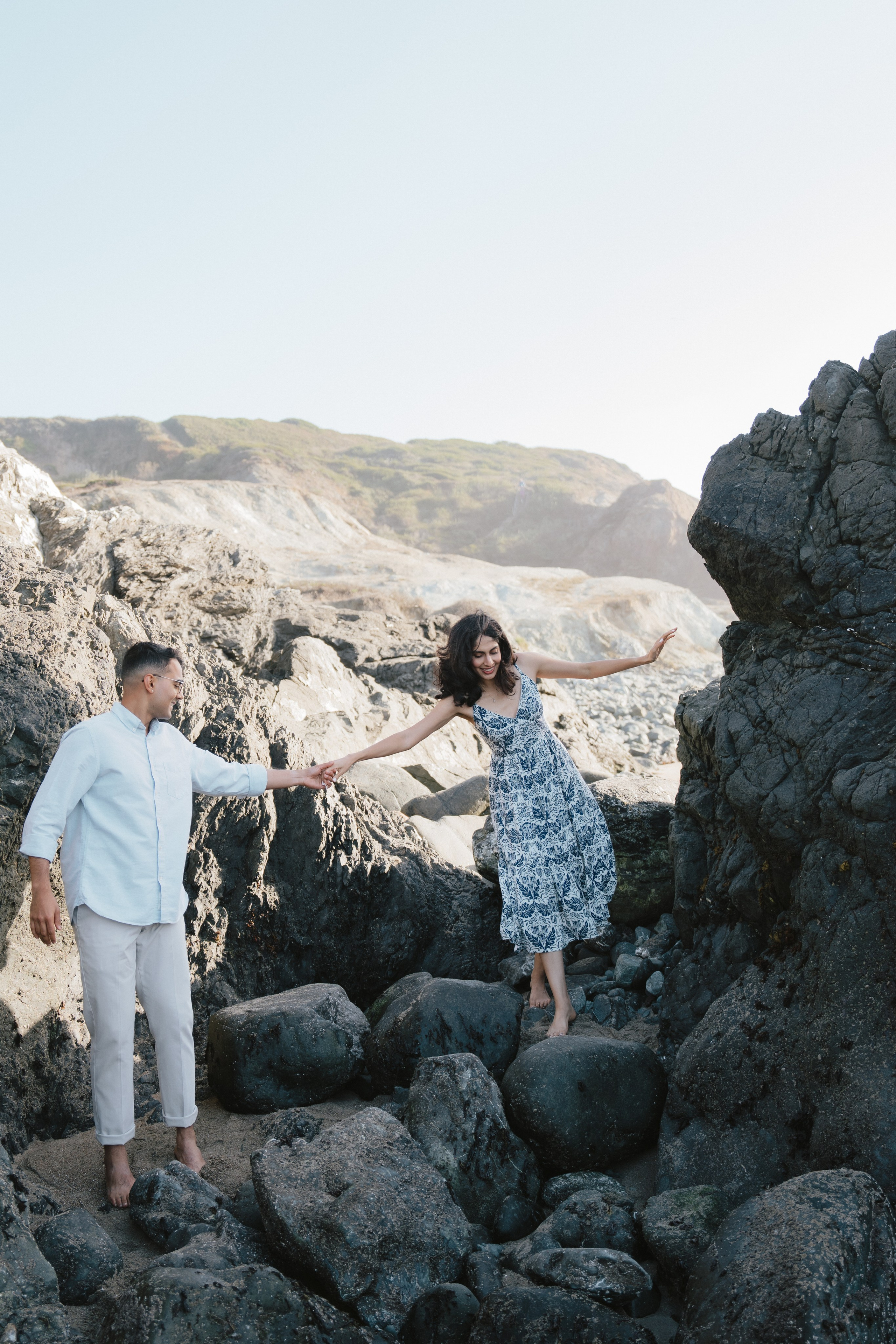 Engagement and Couple’s Photoshoot at Marshall’s Beach with iconic Golden Gate bridge view. Soulo Photography | San Francisco Bay Area Based Photographer