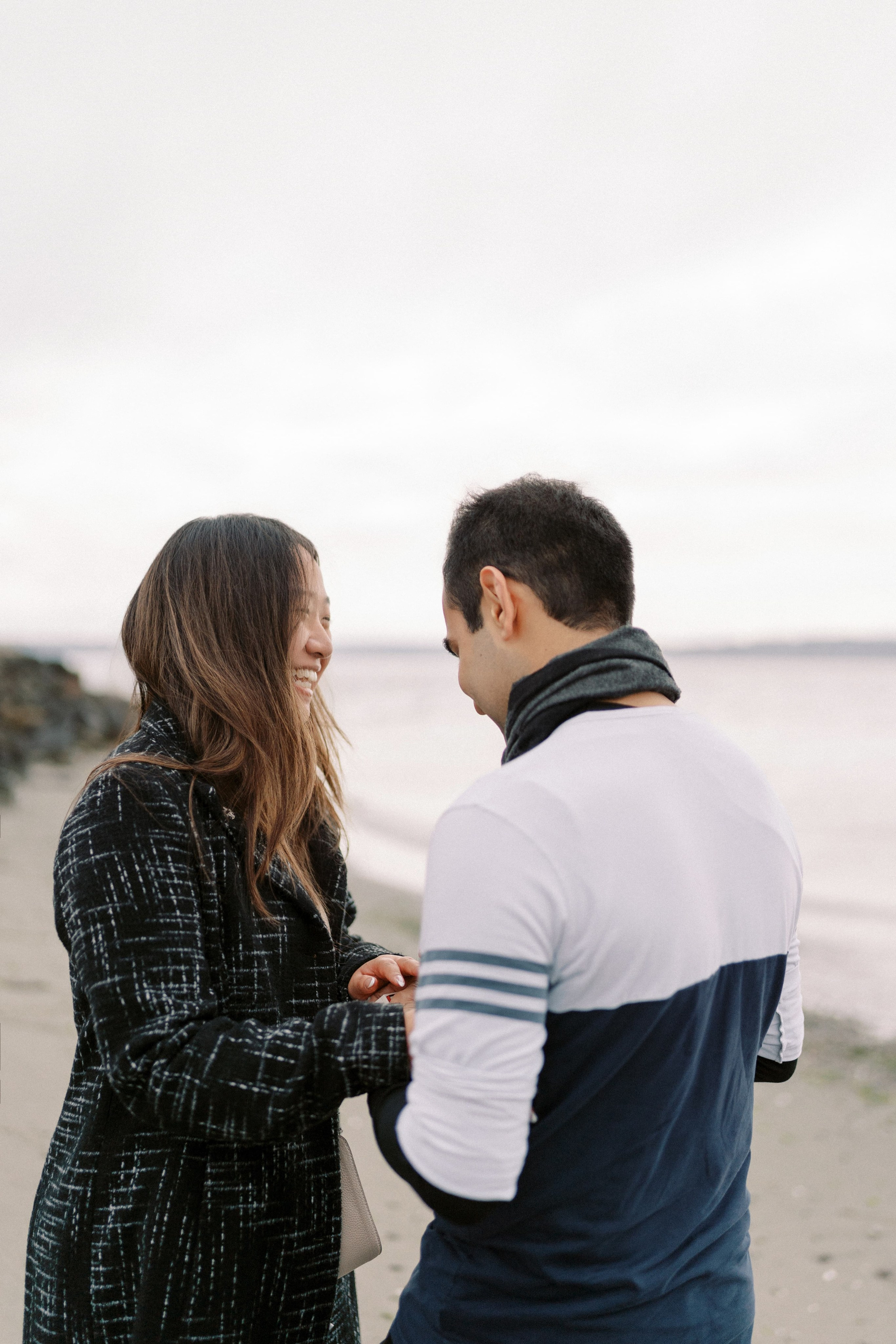 Proposal. December 2024. Alki Point Lighthouse, Washington state. EVAN ARISTOV WEDDING PHOTOGRAPHY — Seattle Wedding Photographer