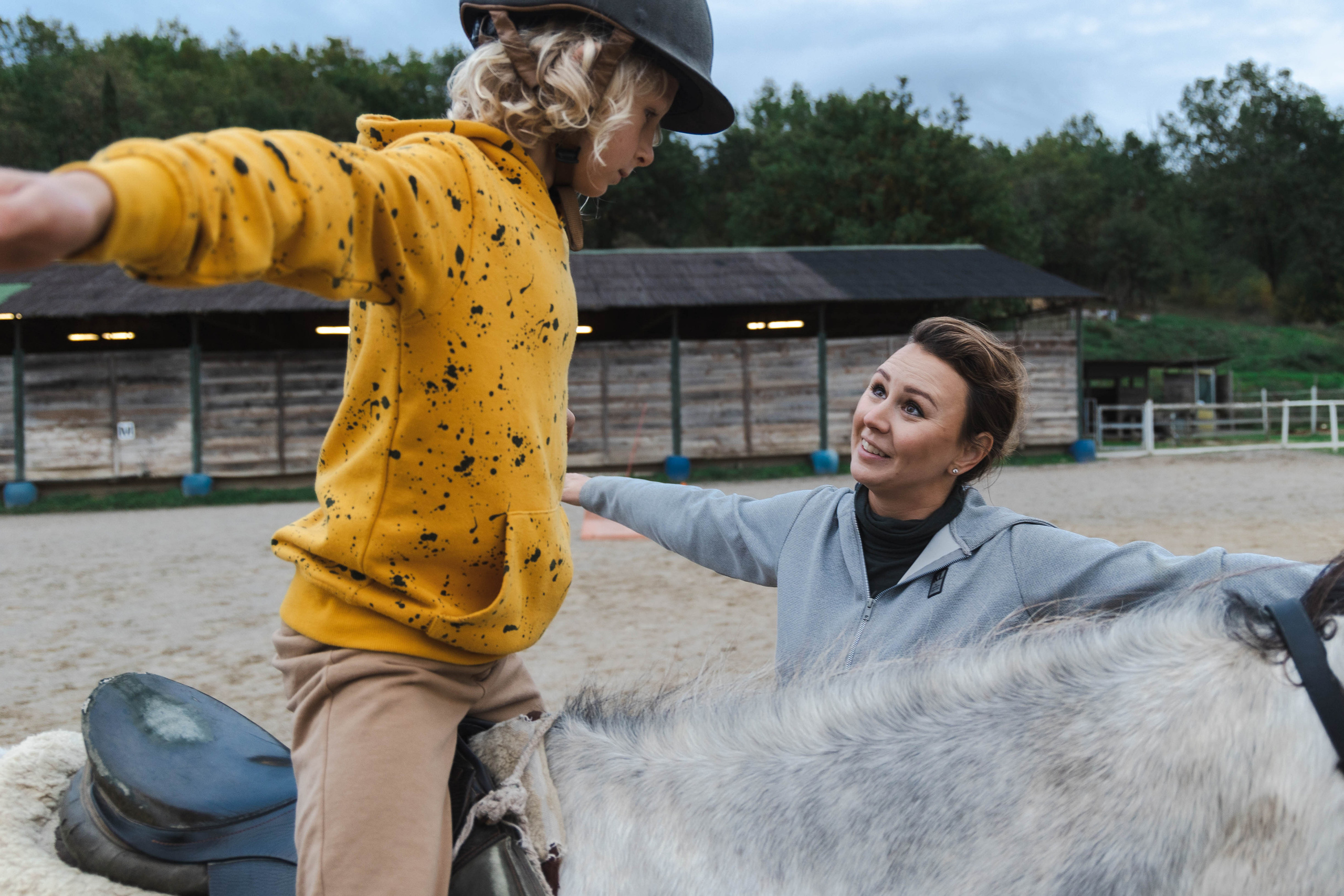 Filip and horses in Italy. Nina Janeckova Photographer and Videographer in Bodensee Ravensburg