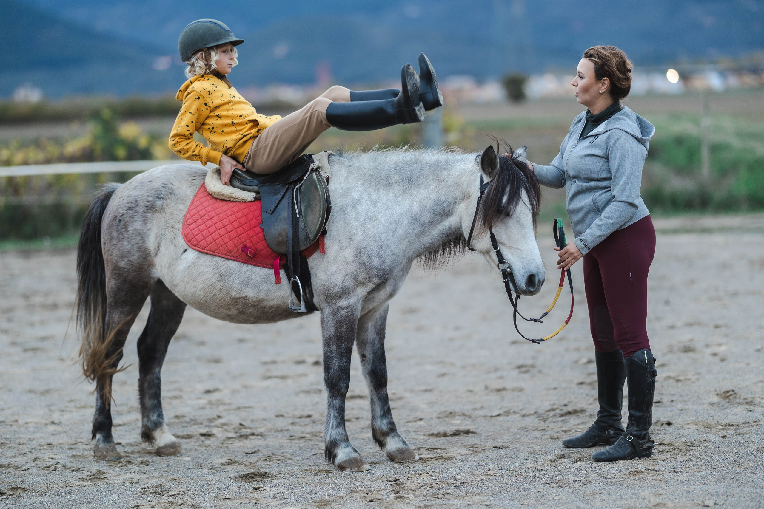 Filip and horses in Italy. Nina Janeckova Photographer and Videographer in Bodensee Ravensburg