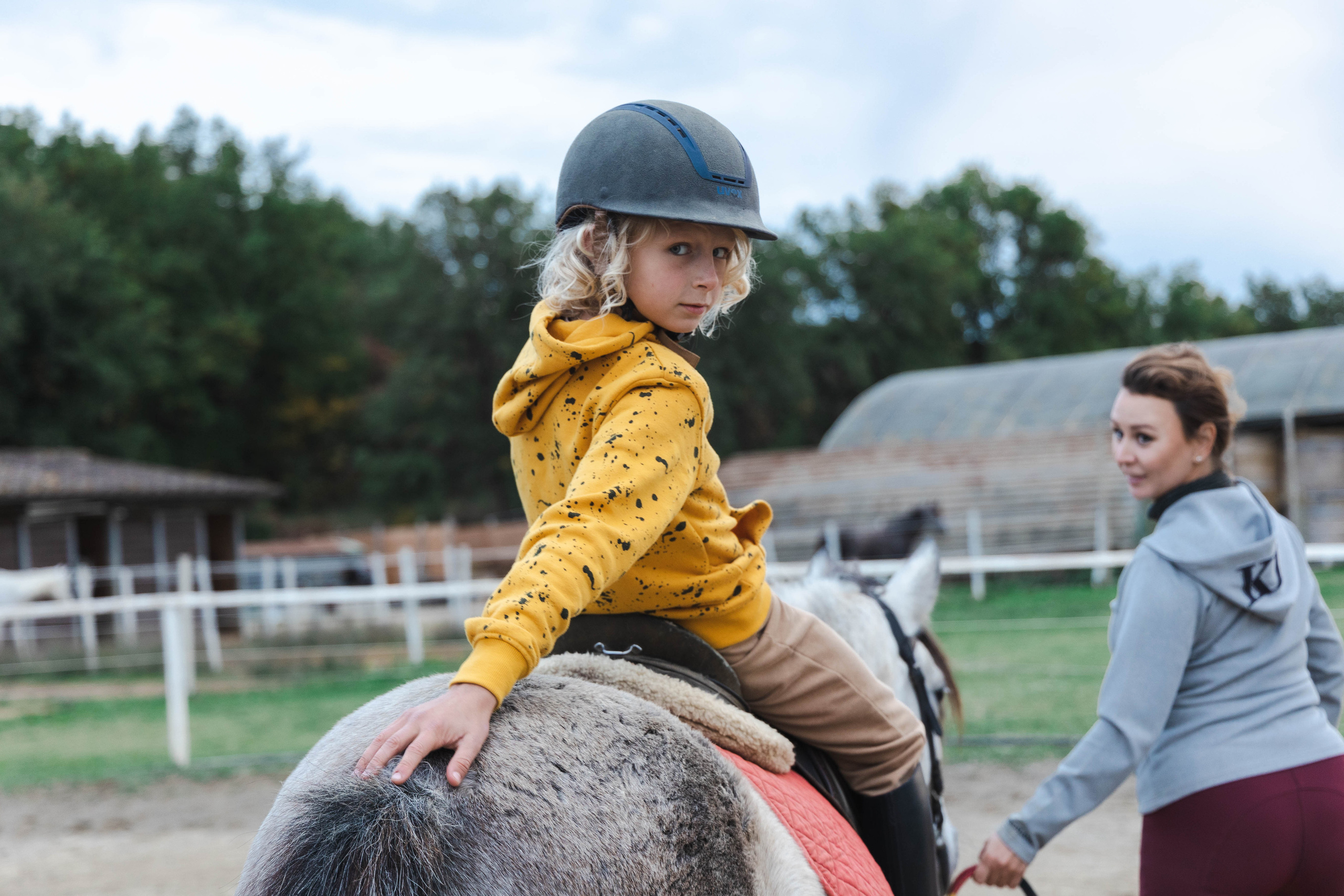 Filip and horses in Italy. Nina Janeckova Photographer and Videographer in Bodensee Ravensburg