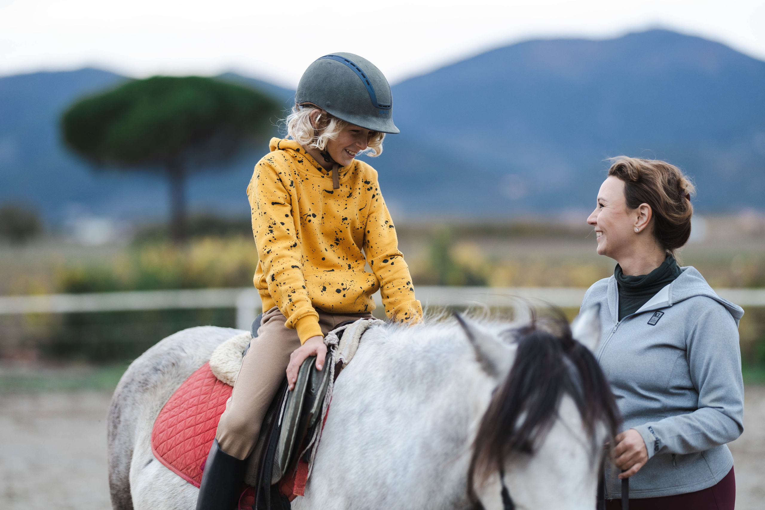 Filip and horses in Italy. Nina Janeckova Photographer and Videographer in Bodensee Ravensburg