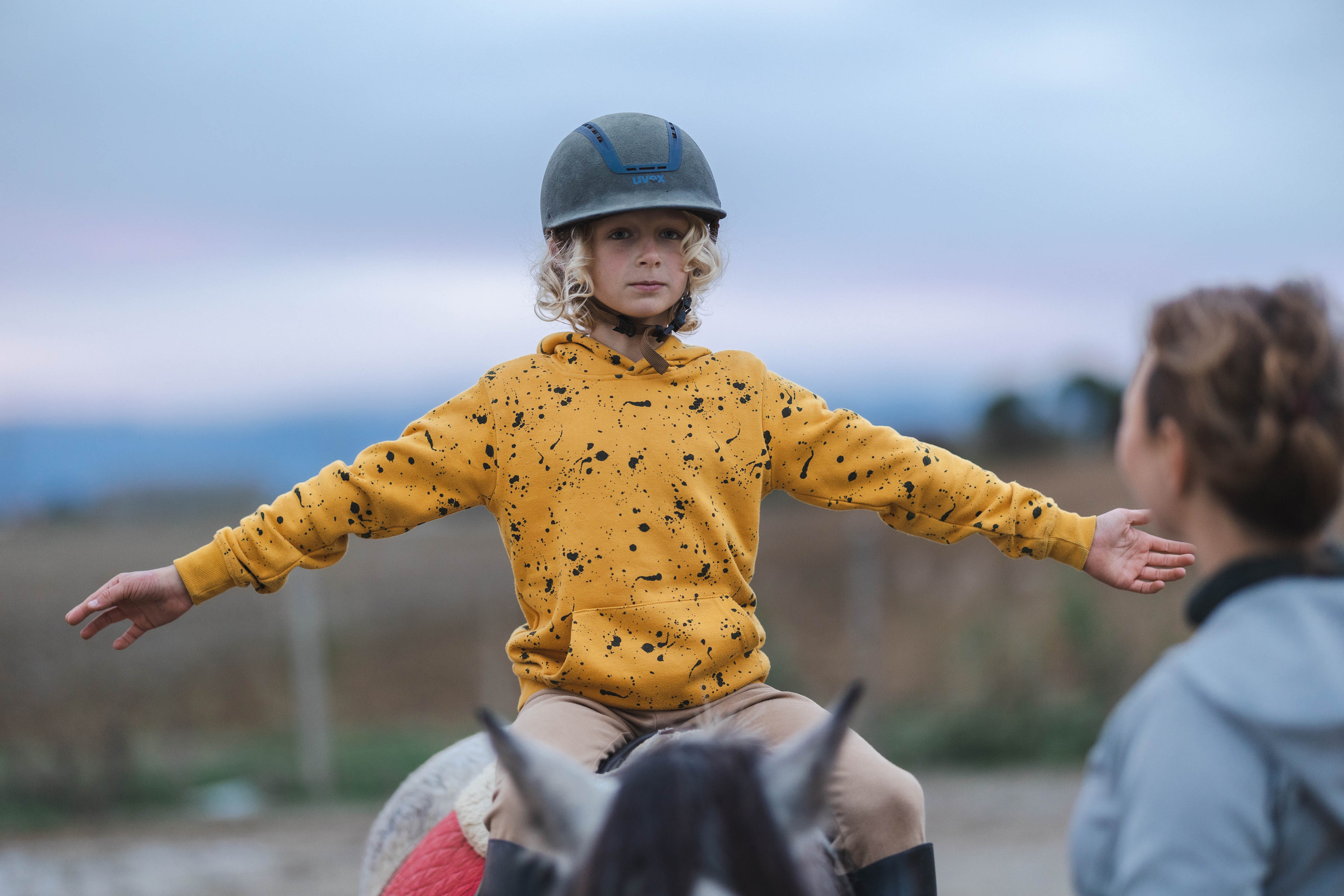 Filip and horses in Italy. Nina Janeckova Photographer and Videographer in Bodensee Ravensburg