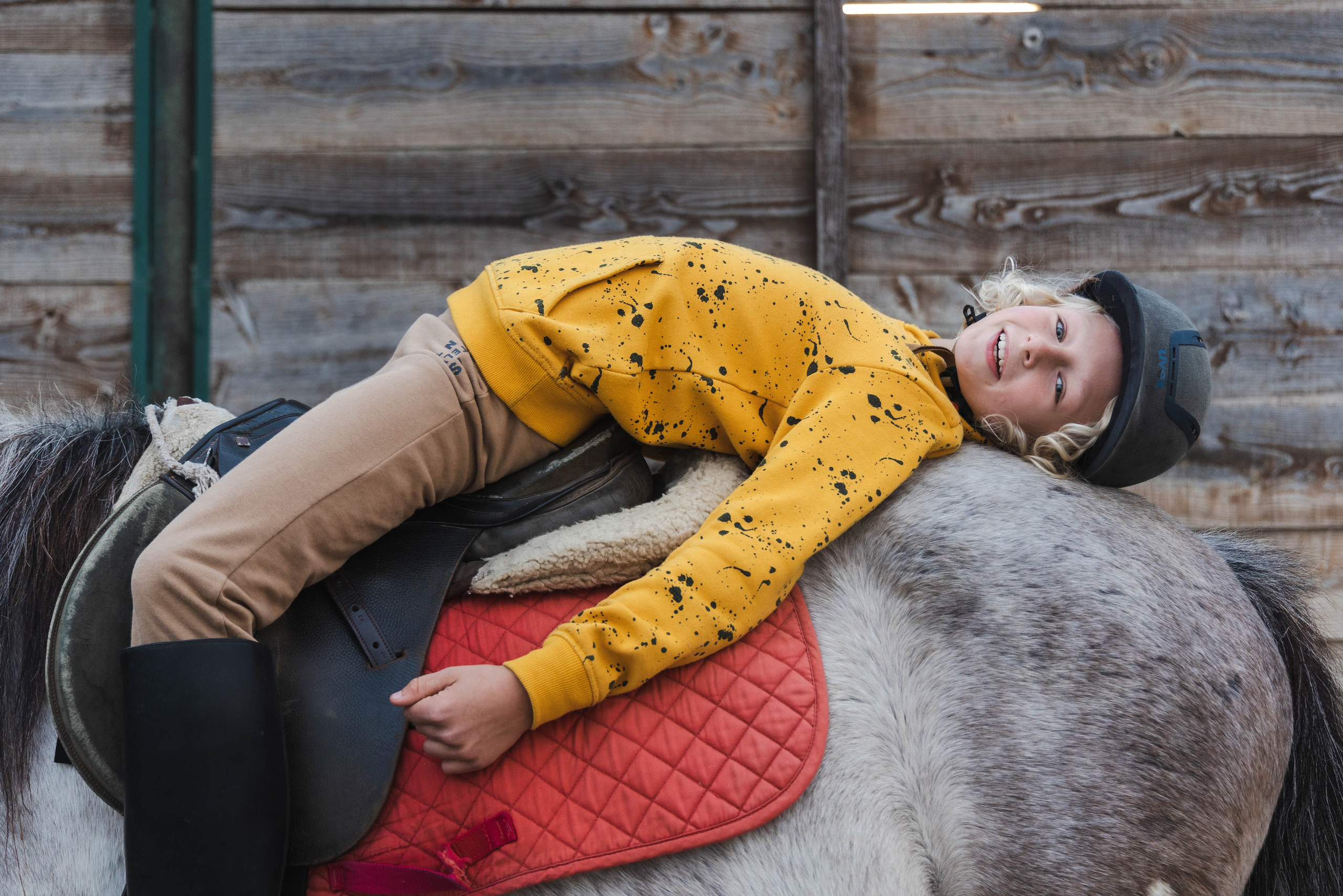 Filip and horses in Italy. Nina Janeckova Photographer and Videographer in Bodensee Ravensburg