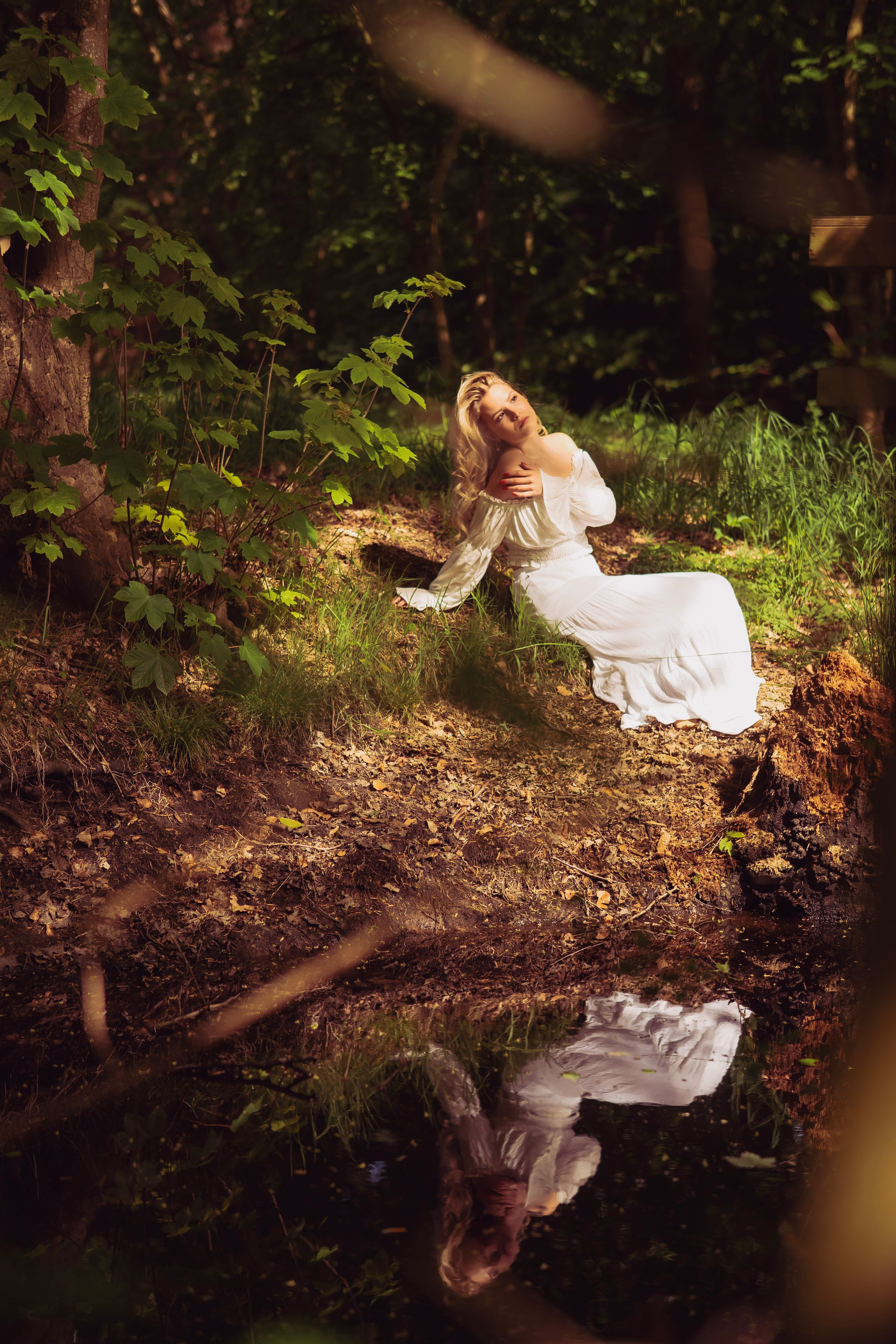 Magical enchanted forest photoshoot in Netherlands with reflection