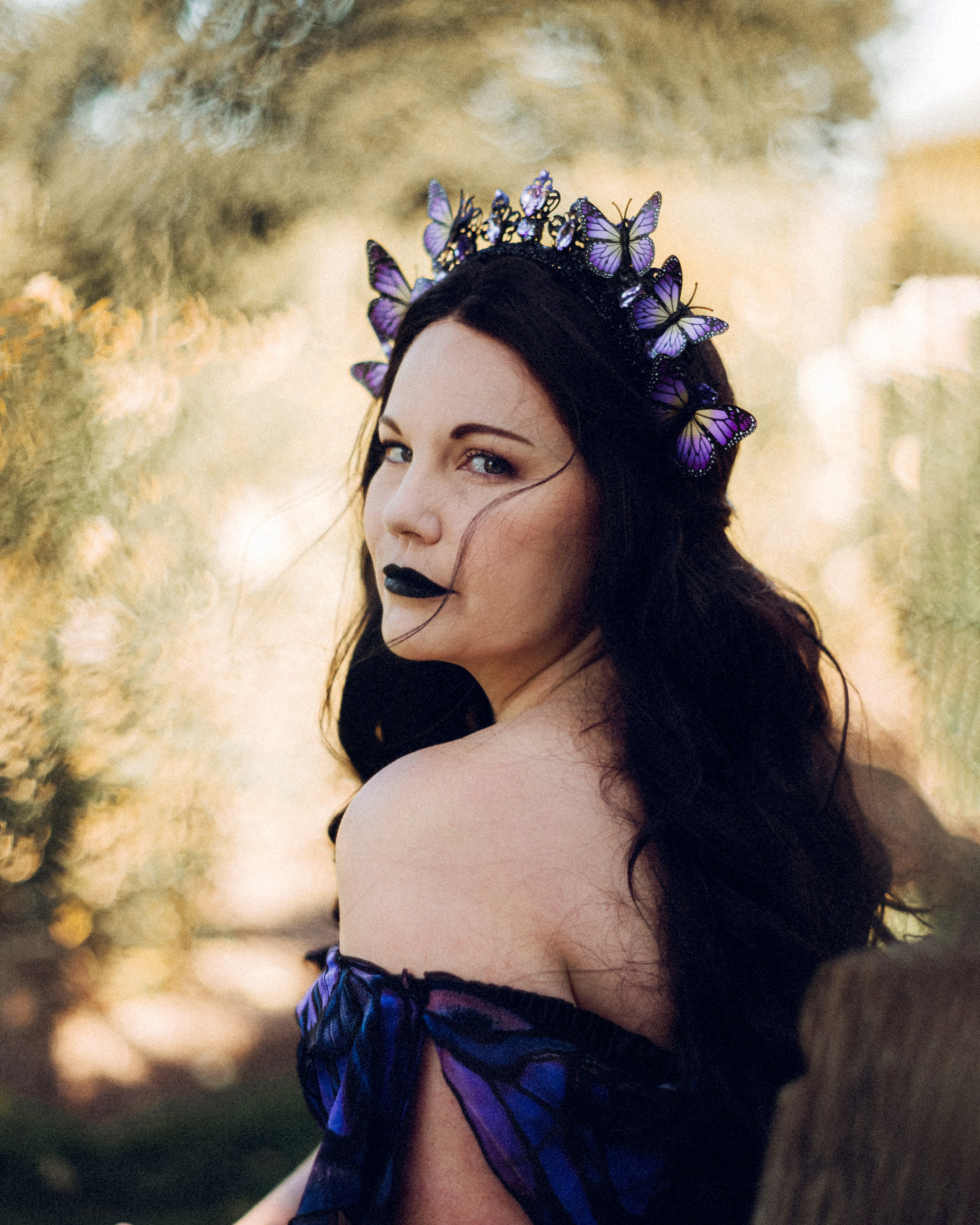 Butterfly purple fairy in a blooming garden. Moth & Moss Photography