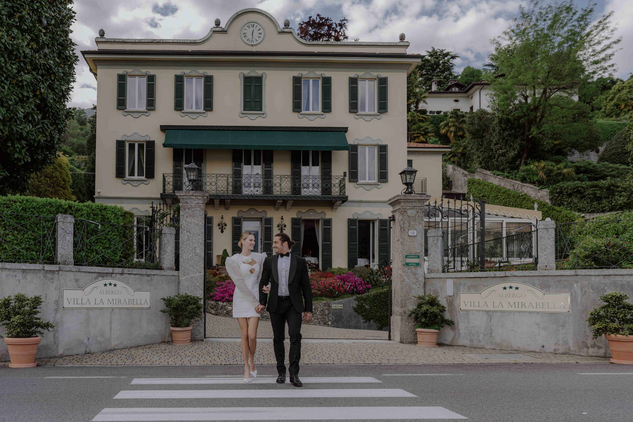     couple leaving villa Lake Como elopement Italy