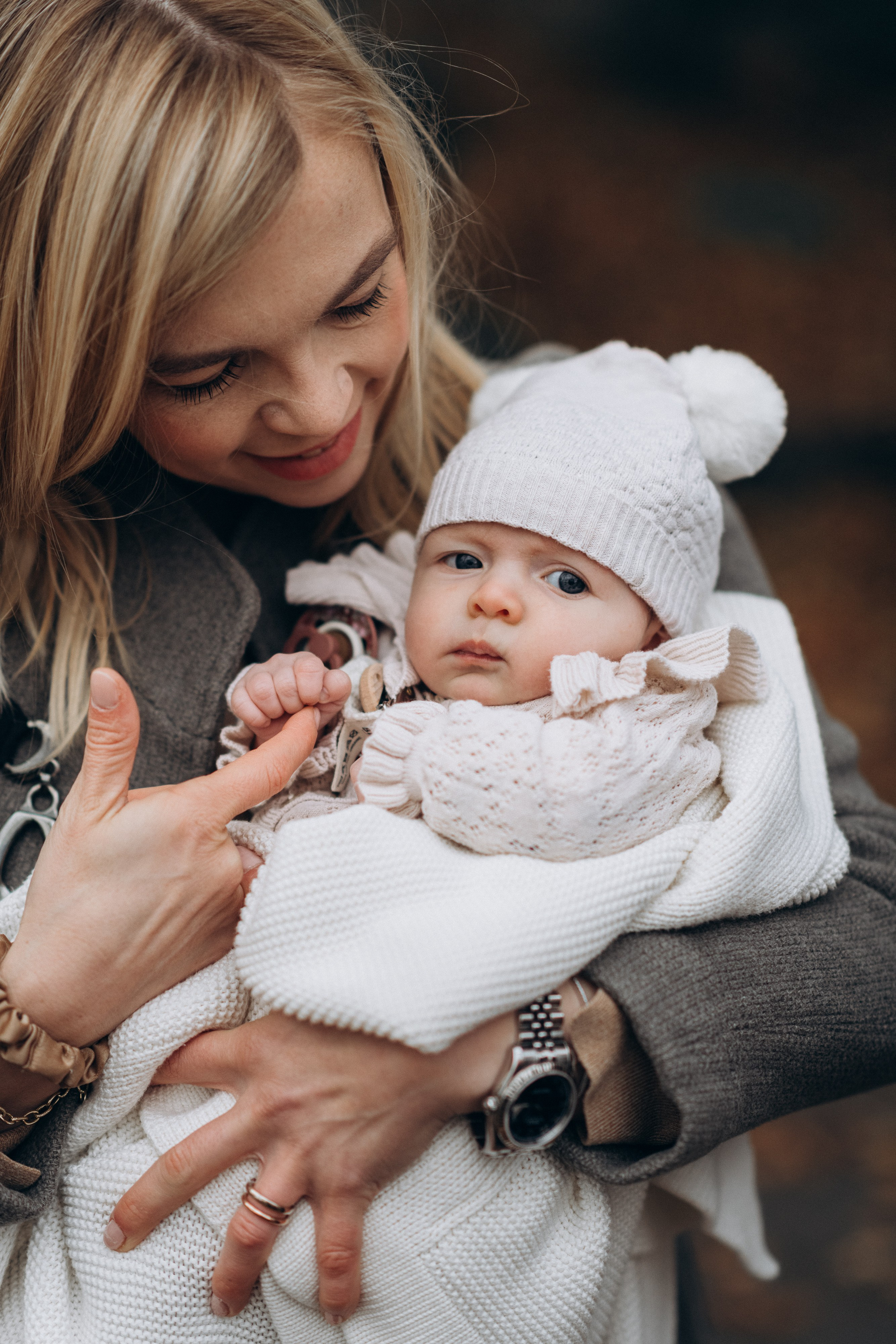mother and baby portrait in the park