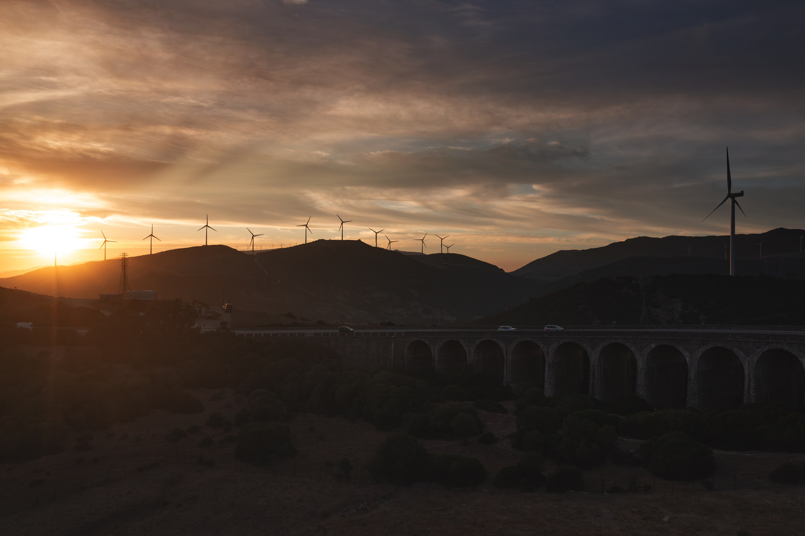 Stunning drone shot of Tarifa’s rolling hills and wind farms by Marbella aerial photographer