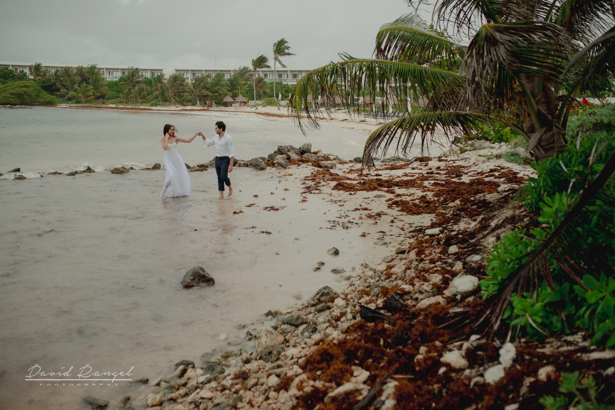 Secilia and Brandon tras the dress at the Conrad Tulum Hotel. Destination wedding photographer based in Cancun and Riviera Maya with service worldwide