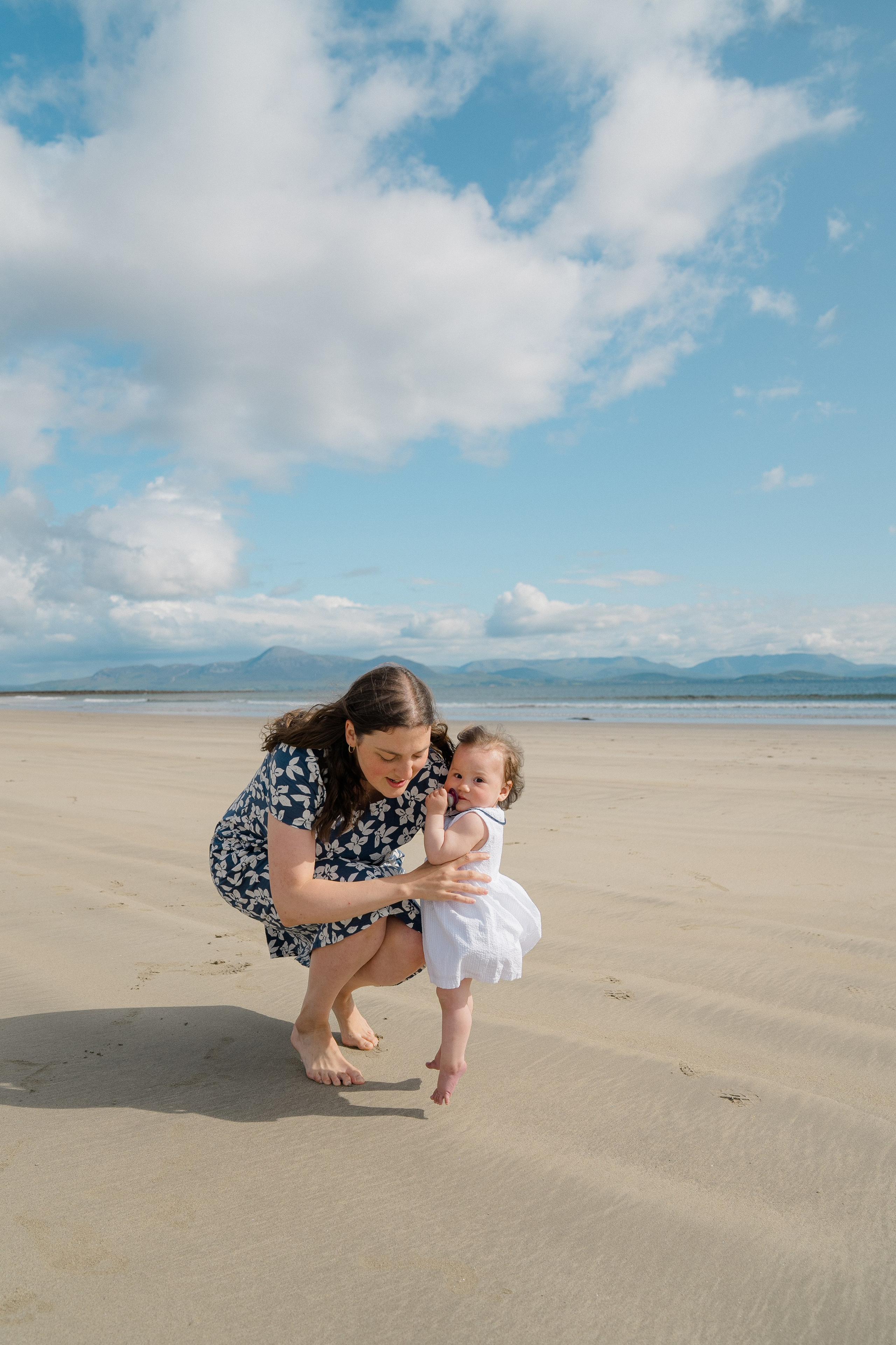 Darya and Mia at the ocean. Wedding and family photographer Ireland