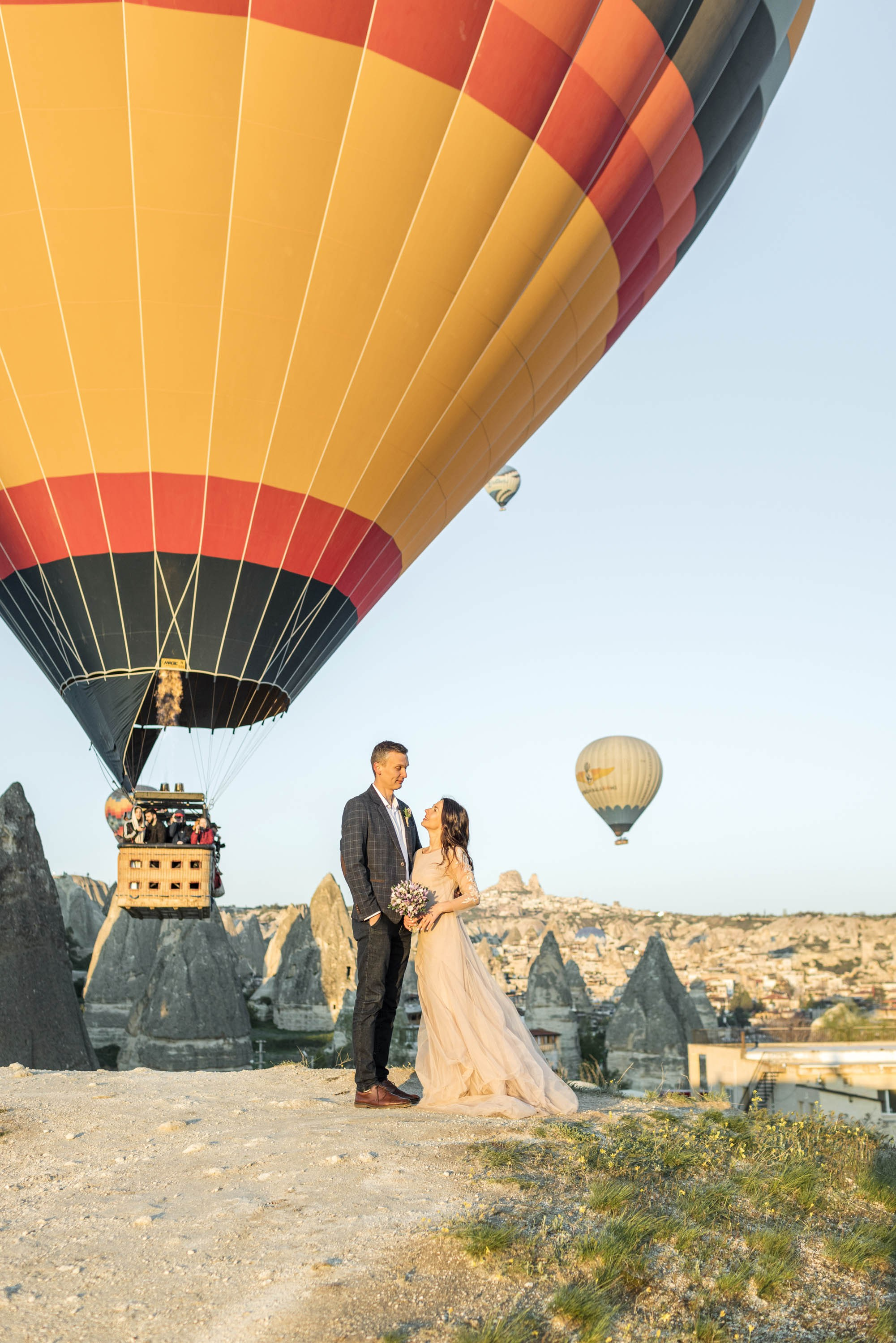 Magical Wedding Photoshoot in Cappadocia: Balloons, Caves, and Valleys. Julia Ganch I Fashion Wedding Photography I Cappadocia Turkey