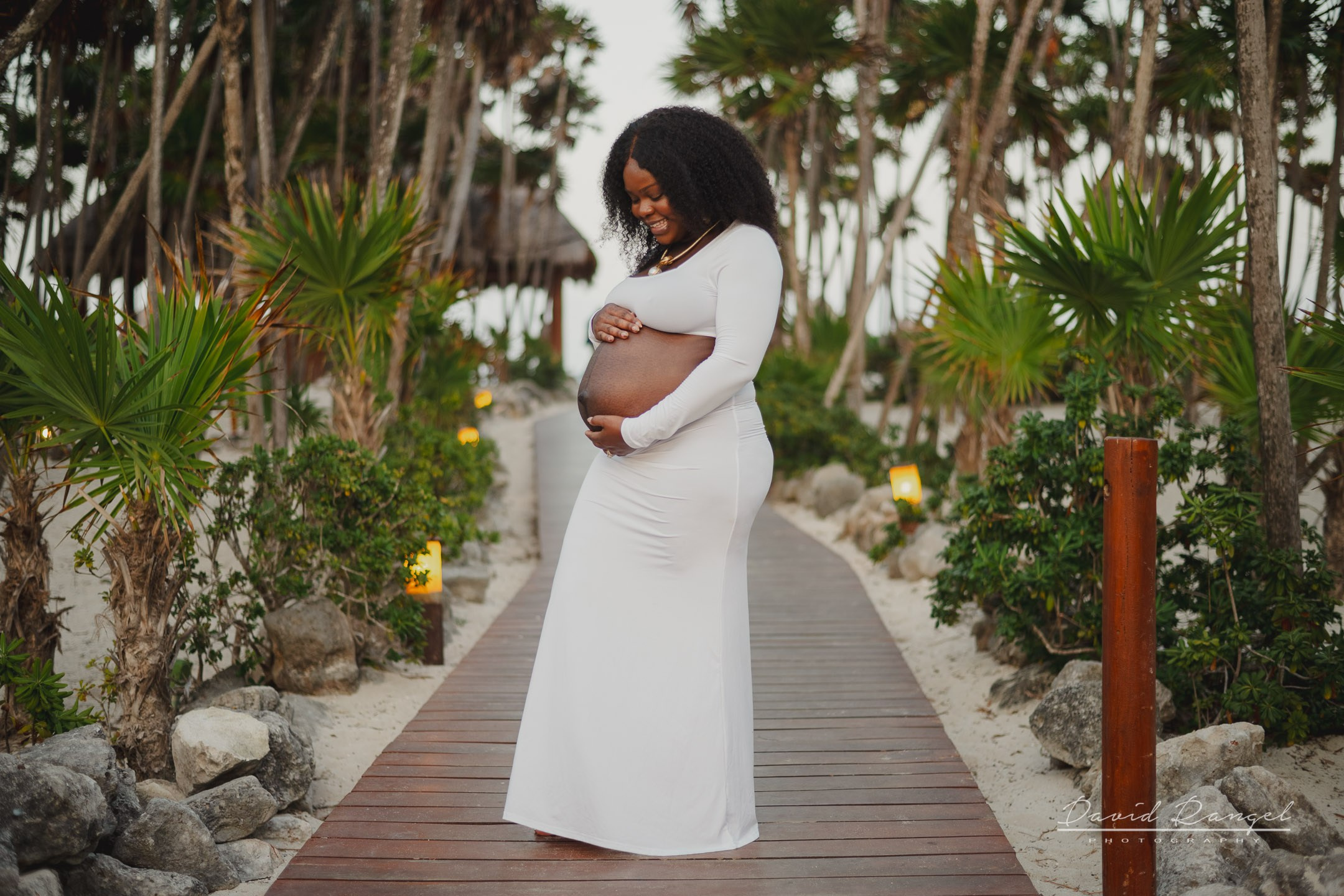 Maternity session of Ketsia & Ricketson at the beautiful colonial-style Valentin Imperial Maya Hotel. Destination wedding photographer based in Cancun and Riviera Maya with service worldwide