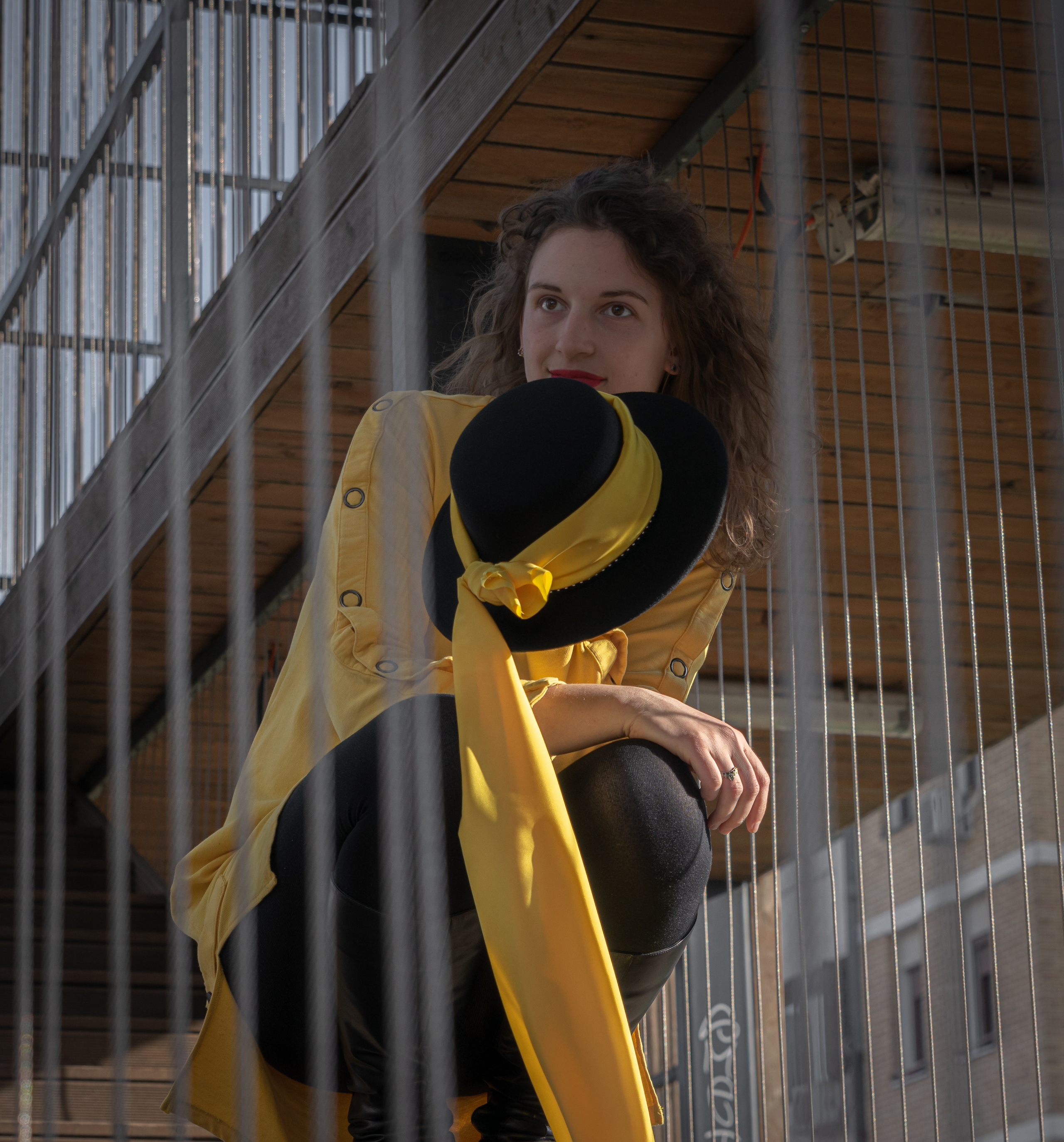 Yellow dress and stunning hat for beautiful lady at the photo shoot. Victoria Fedoseenko. Photographer from Serbia