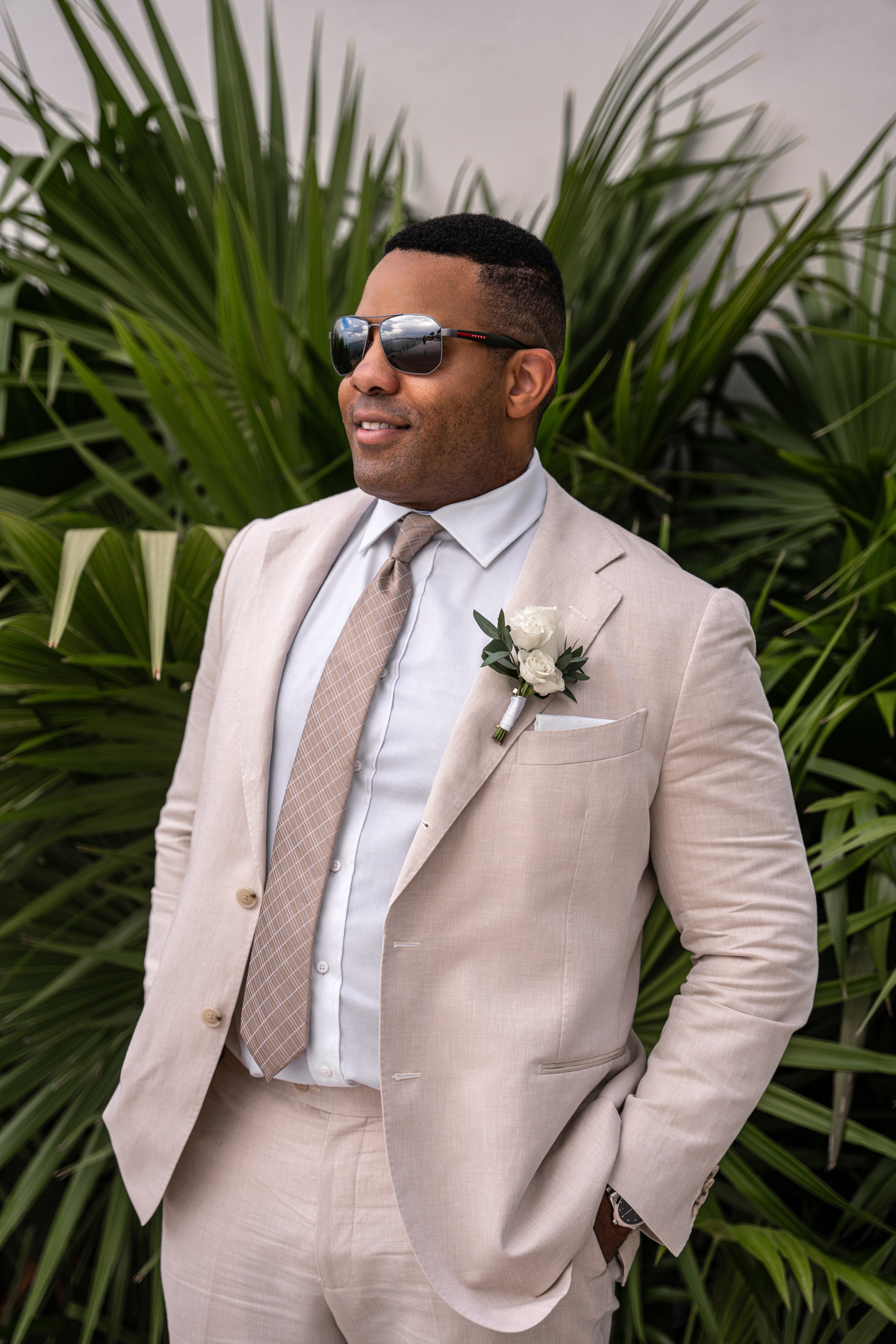 Cool groom portrait by Cancun wedding photographer Victoria Liskova