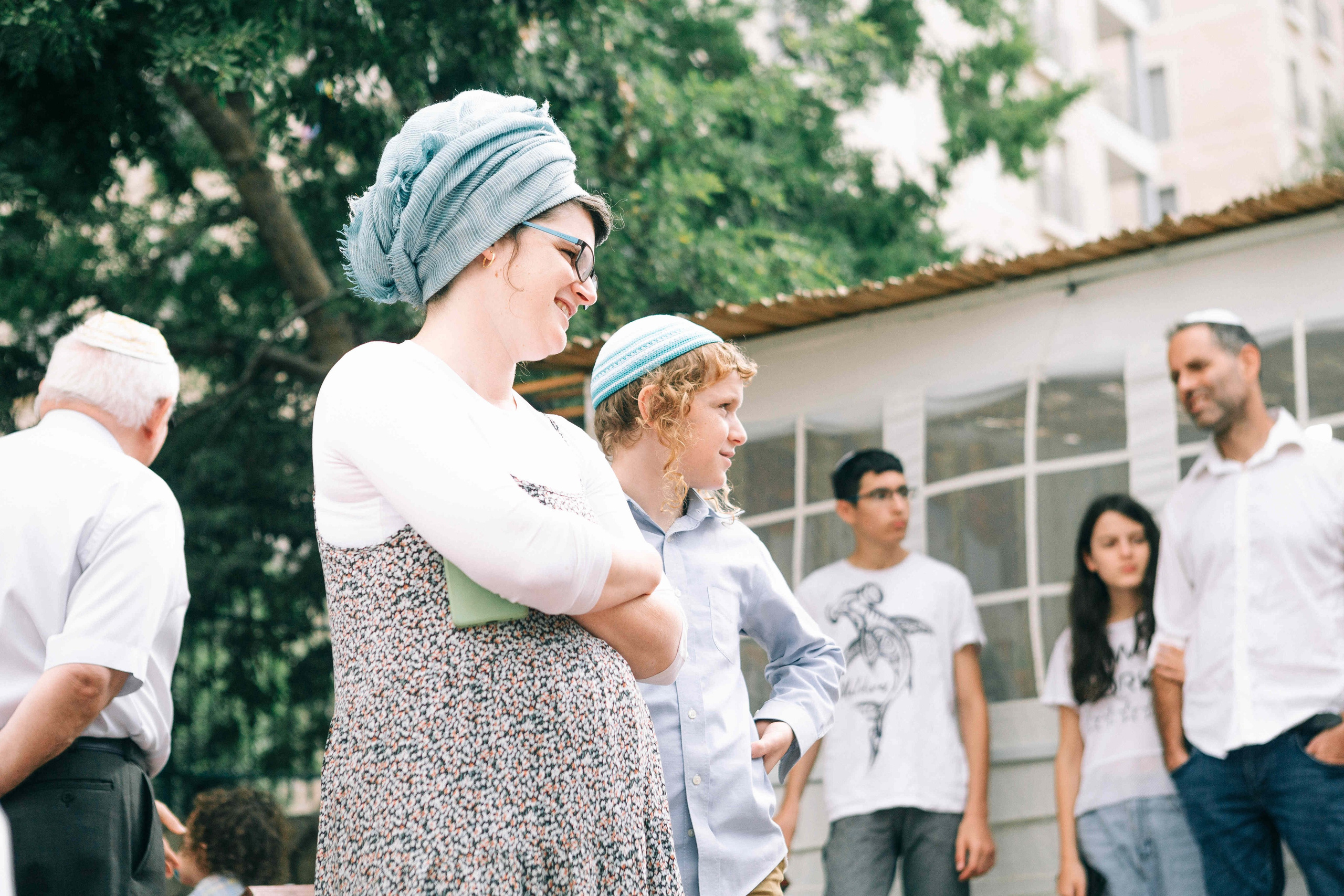 BRITH MILA IN THE SMALL SYNAGOGUE. PHOTOGRAPHER IN ISRAEL