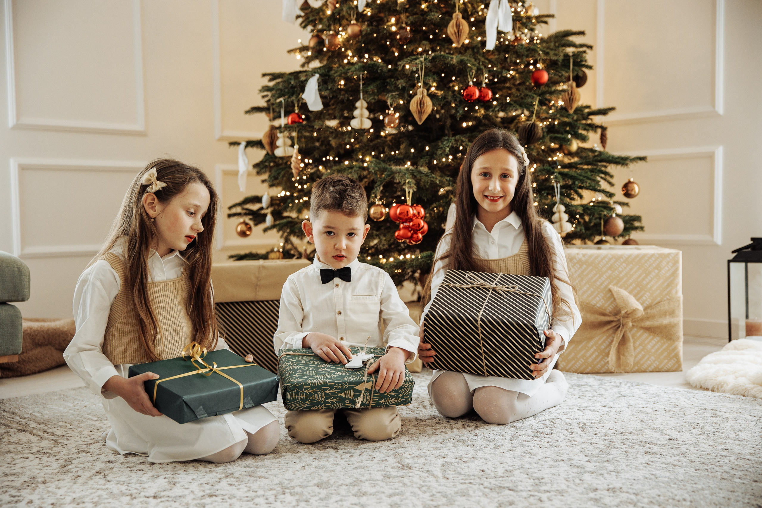Children with Christmas presents