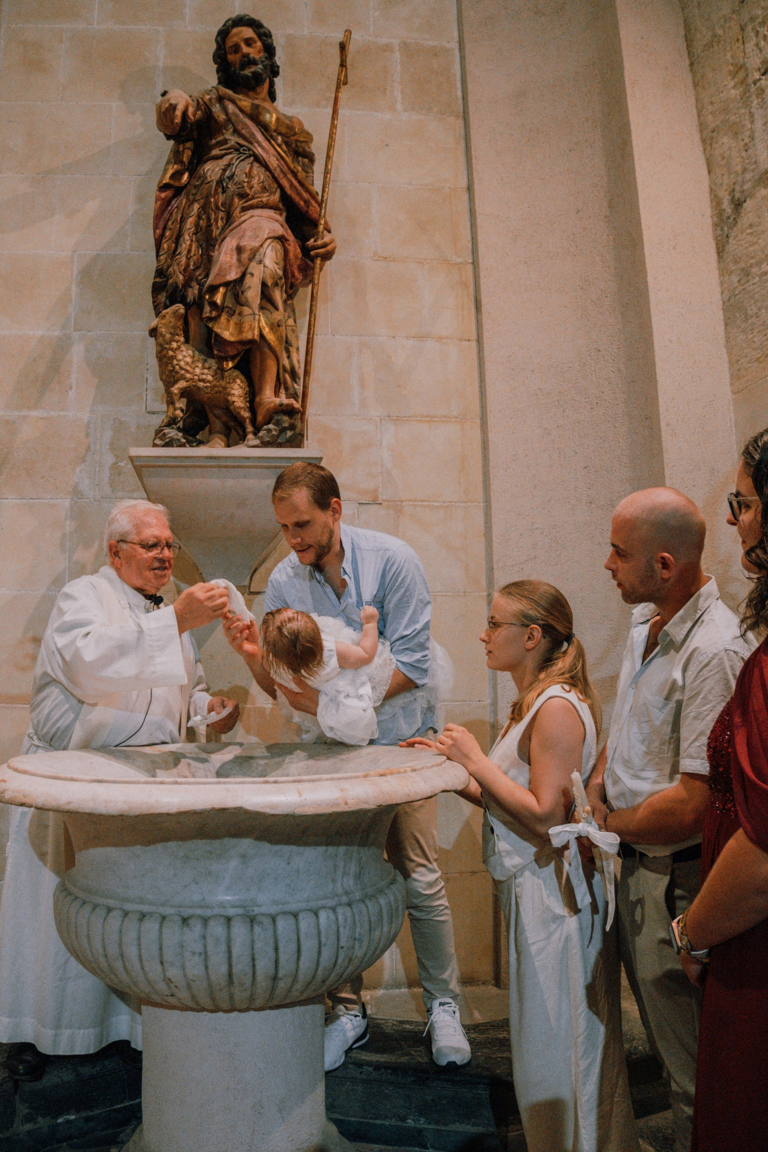 Bautizo. Fotografía profesional en Calafell - Elena Medvedeva