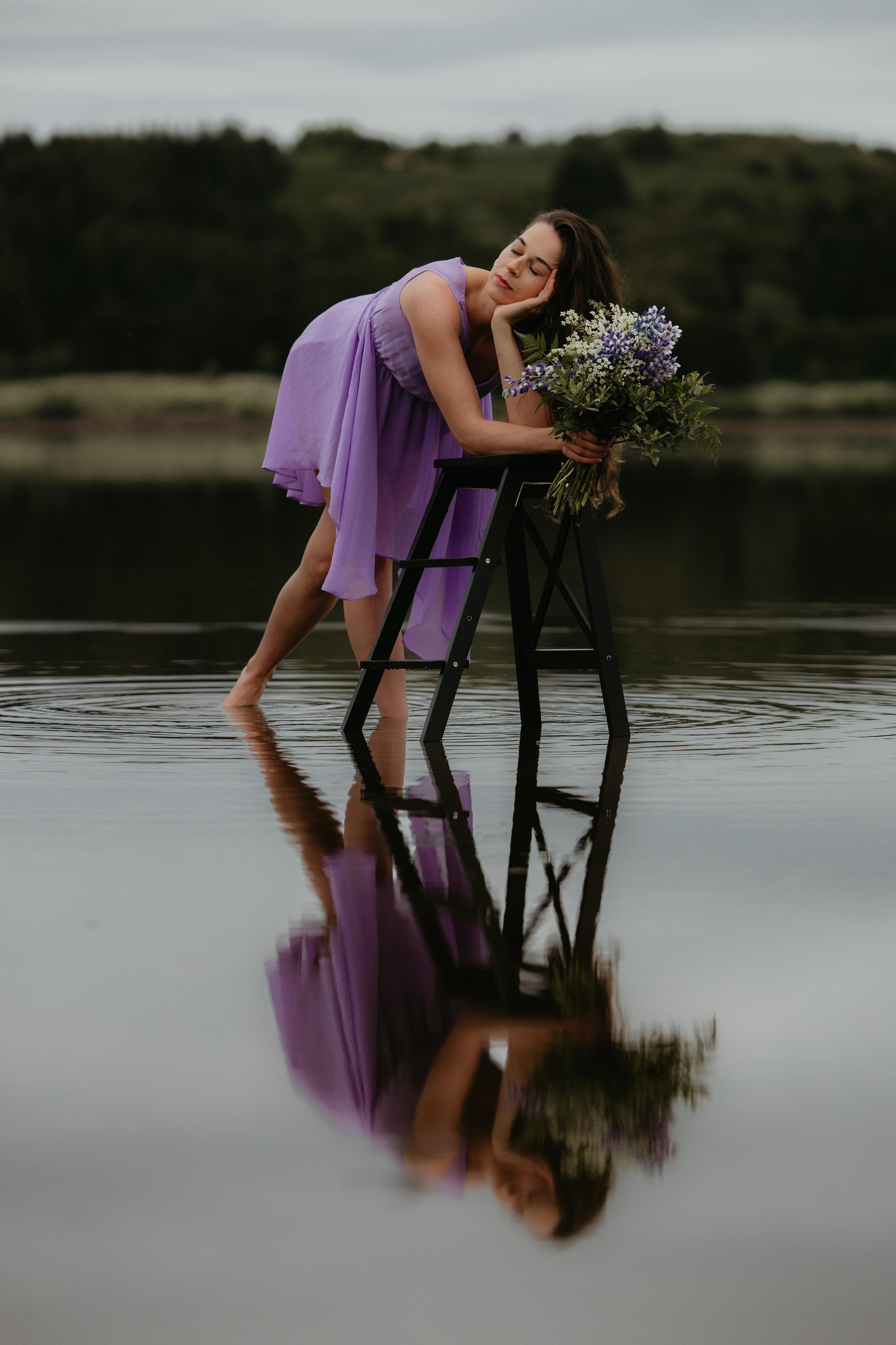 Wind in her hair—dreamy feminine portrait in Iceland’s dramatic natural scenery.