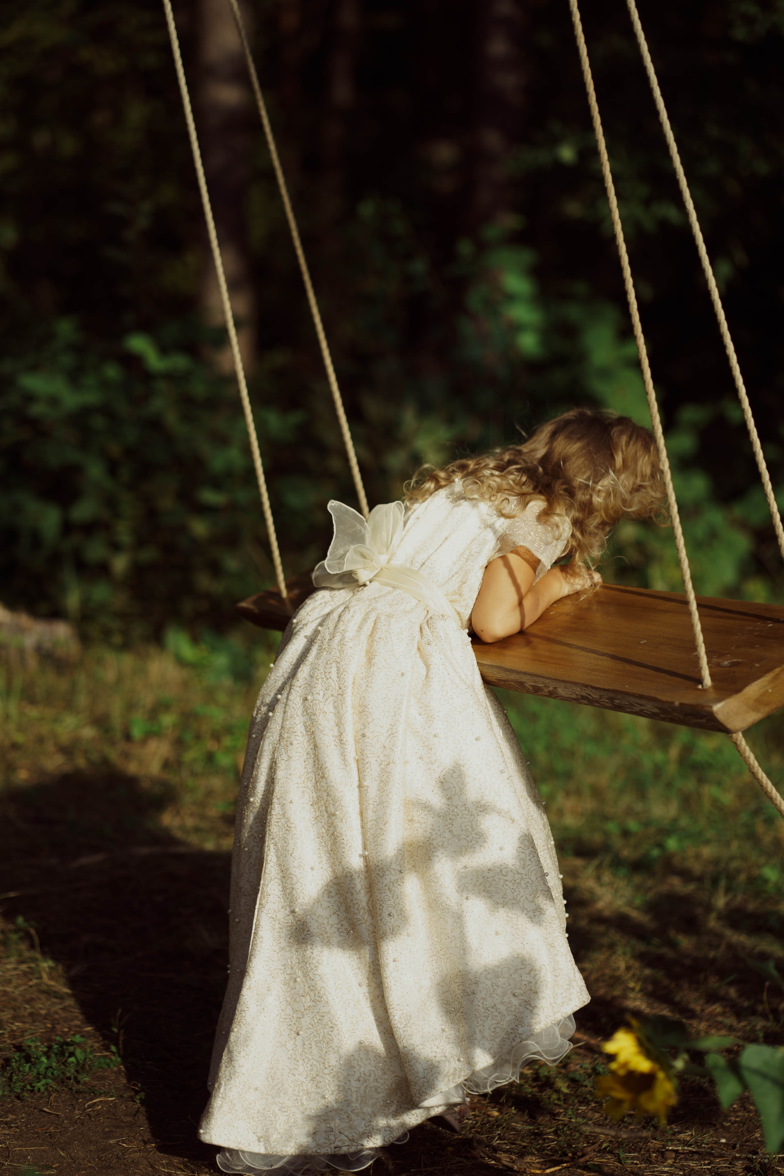 Mama ir dukra — saulėgražose. Fotografija — Olga Bojarin