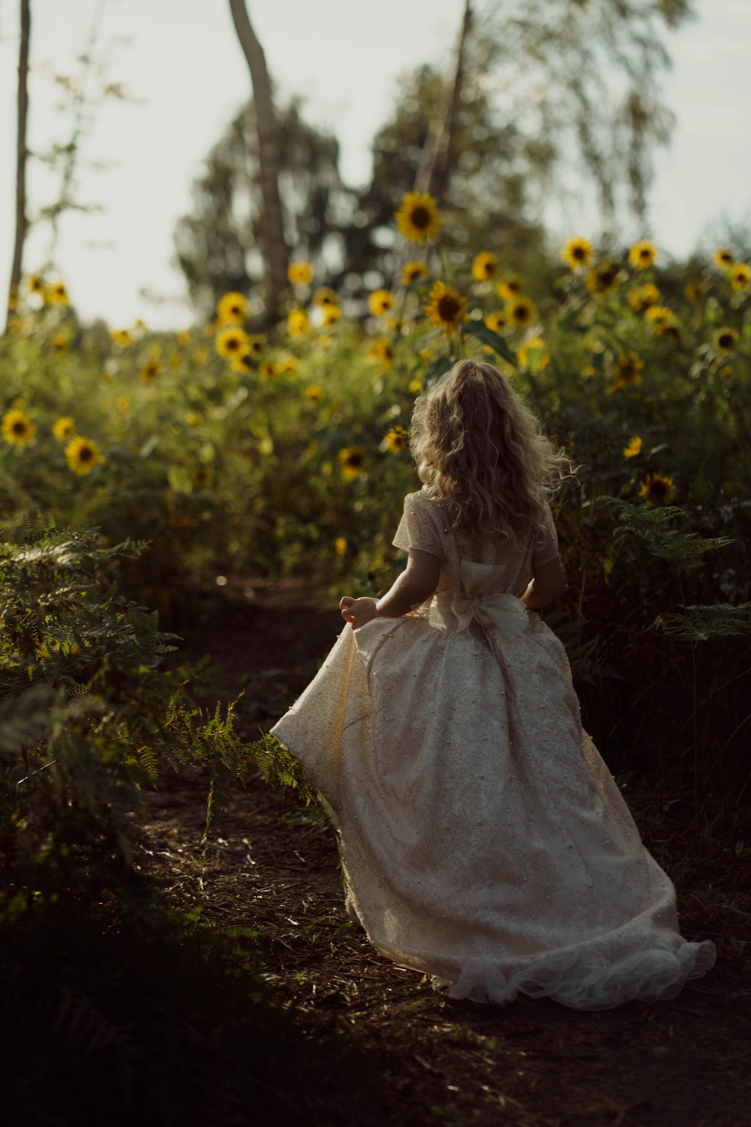 Mama ir dukra — saulėgražose. Fotografija — Olga Bojarin