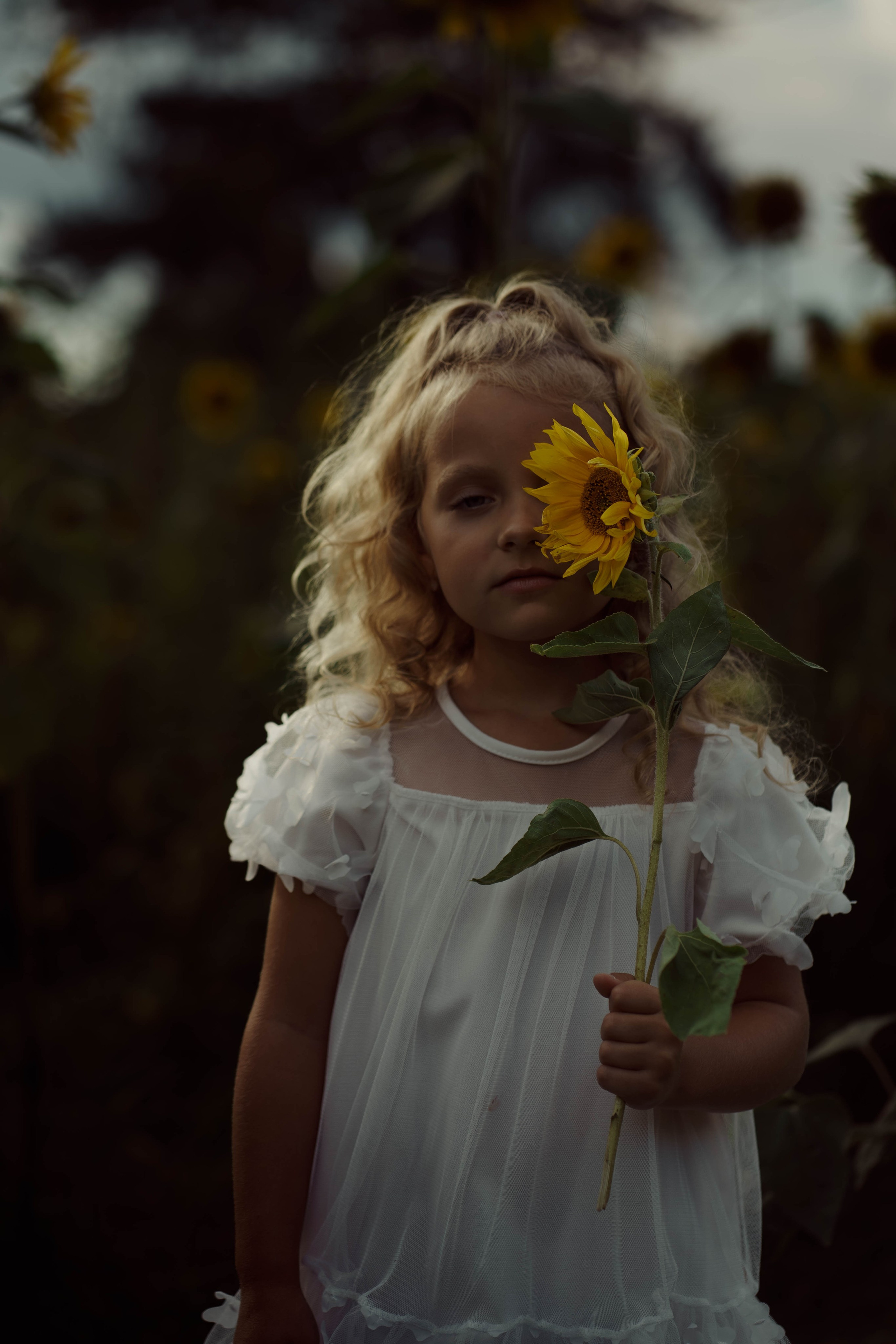 Mama ir dukra — saulėgražose. Fotografija — Olga Bojarin